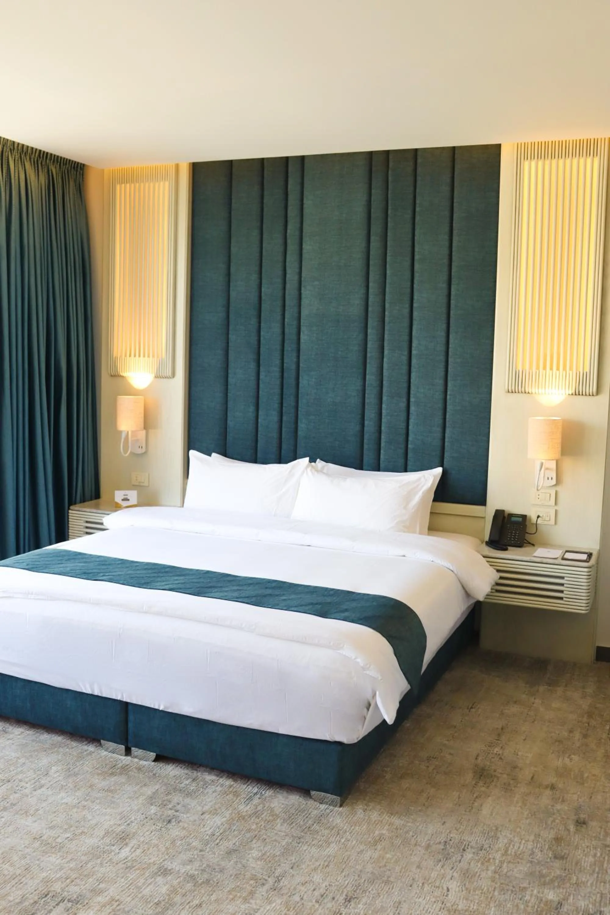 Bed in Rival Hotel Amman