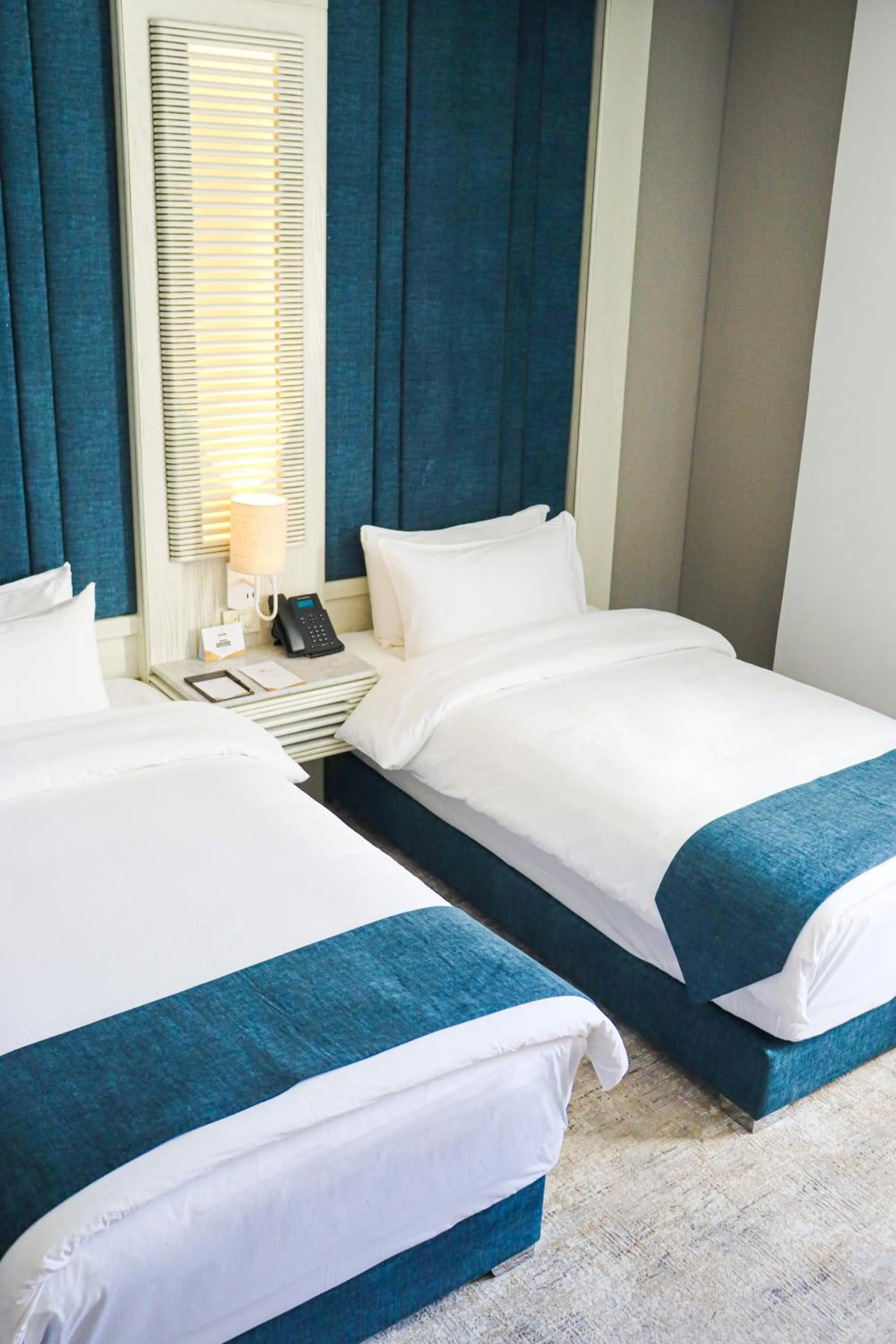 Bed in Rival Hotel Amman