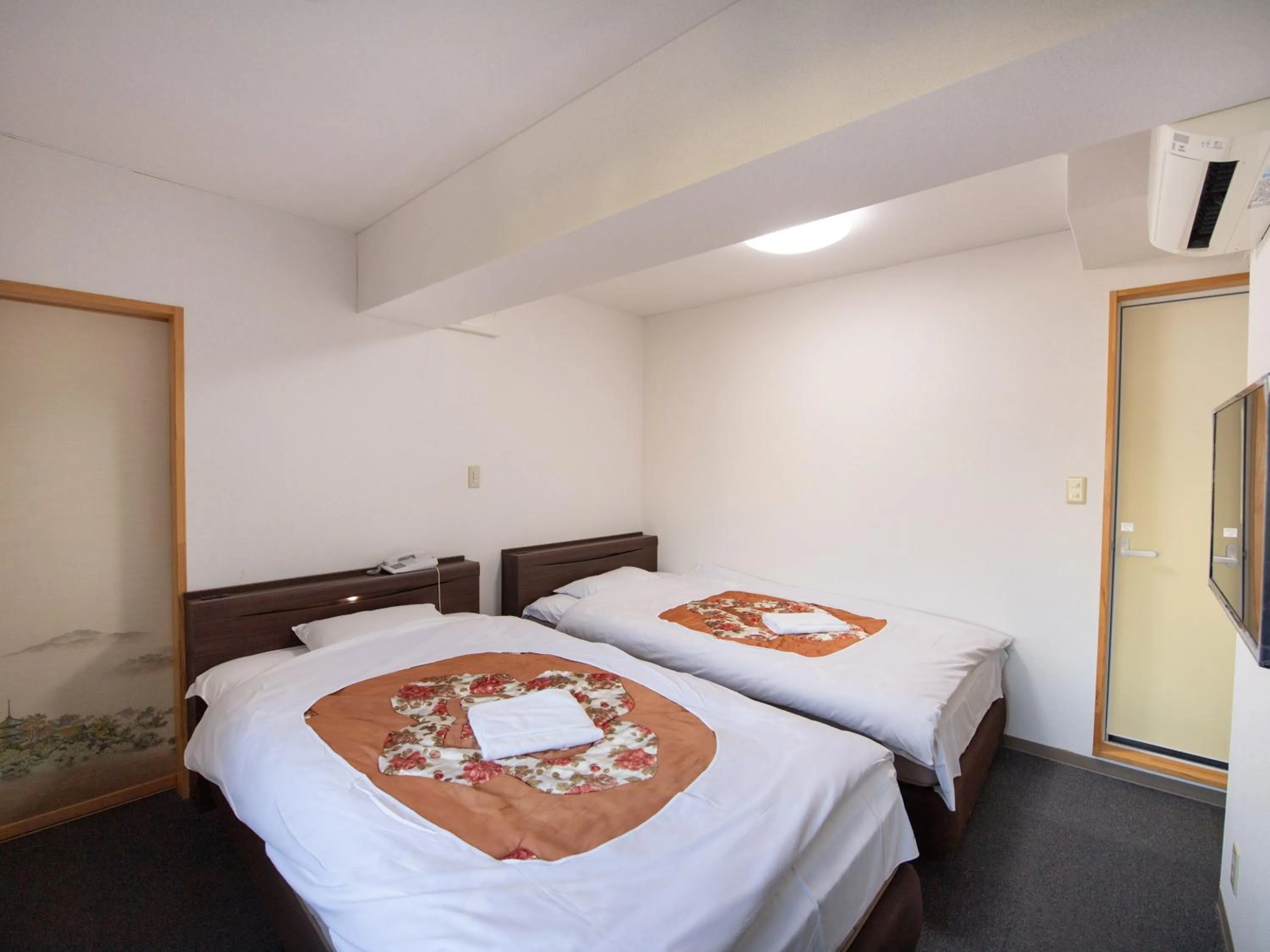 Photo of the whole room, Bed in Tabist Hotel Yamashiro Onsen