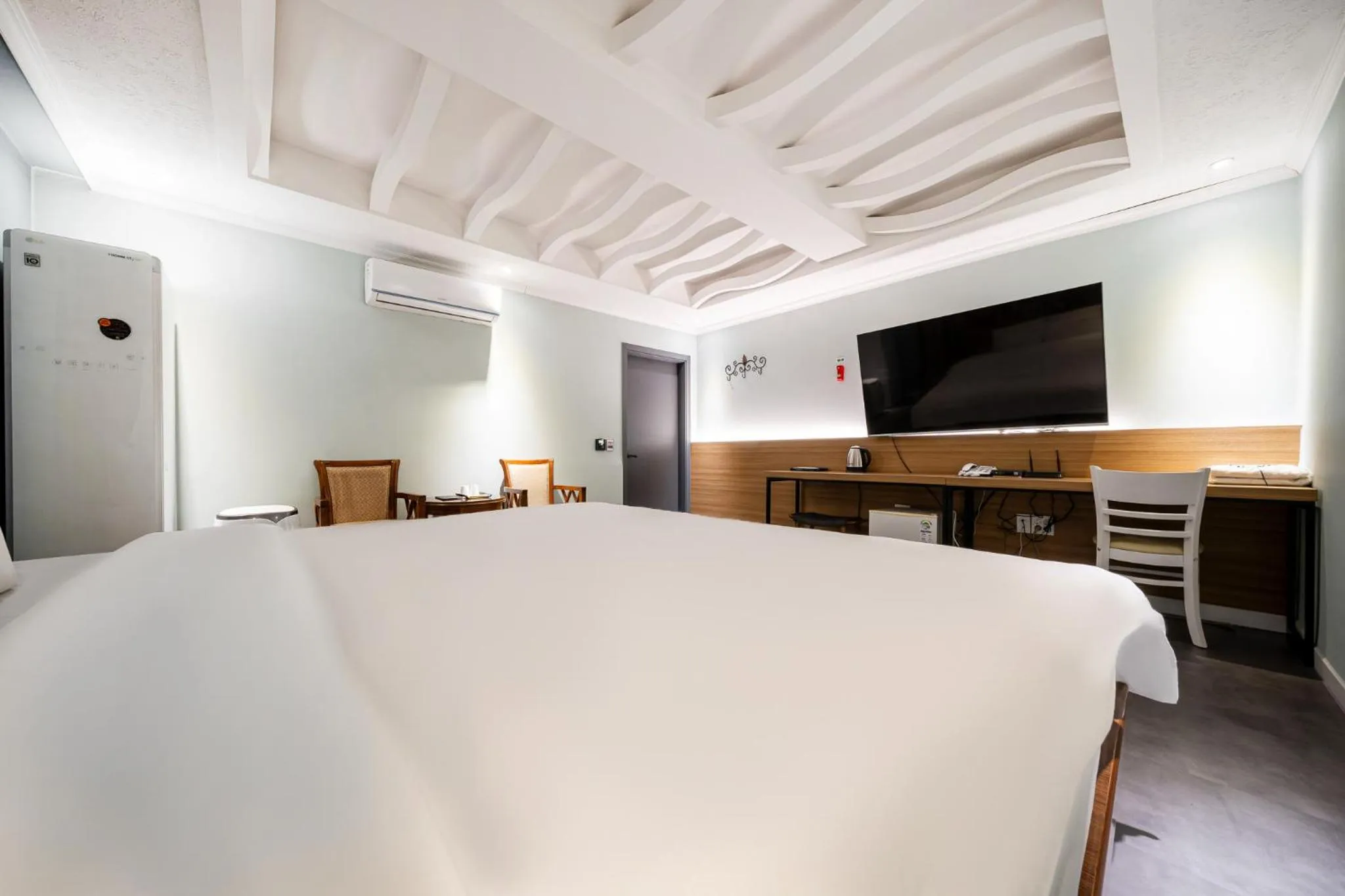 Bed in Hotel New Evergreen