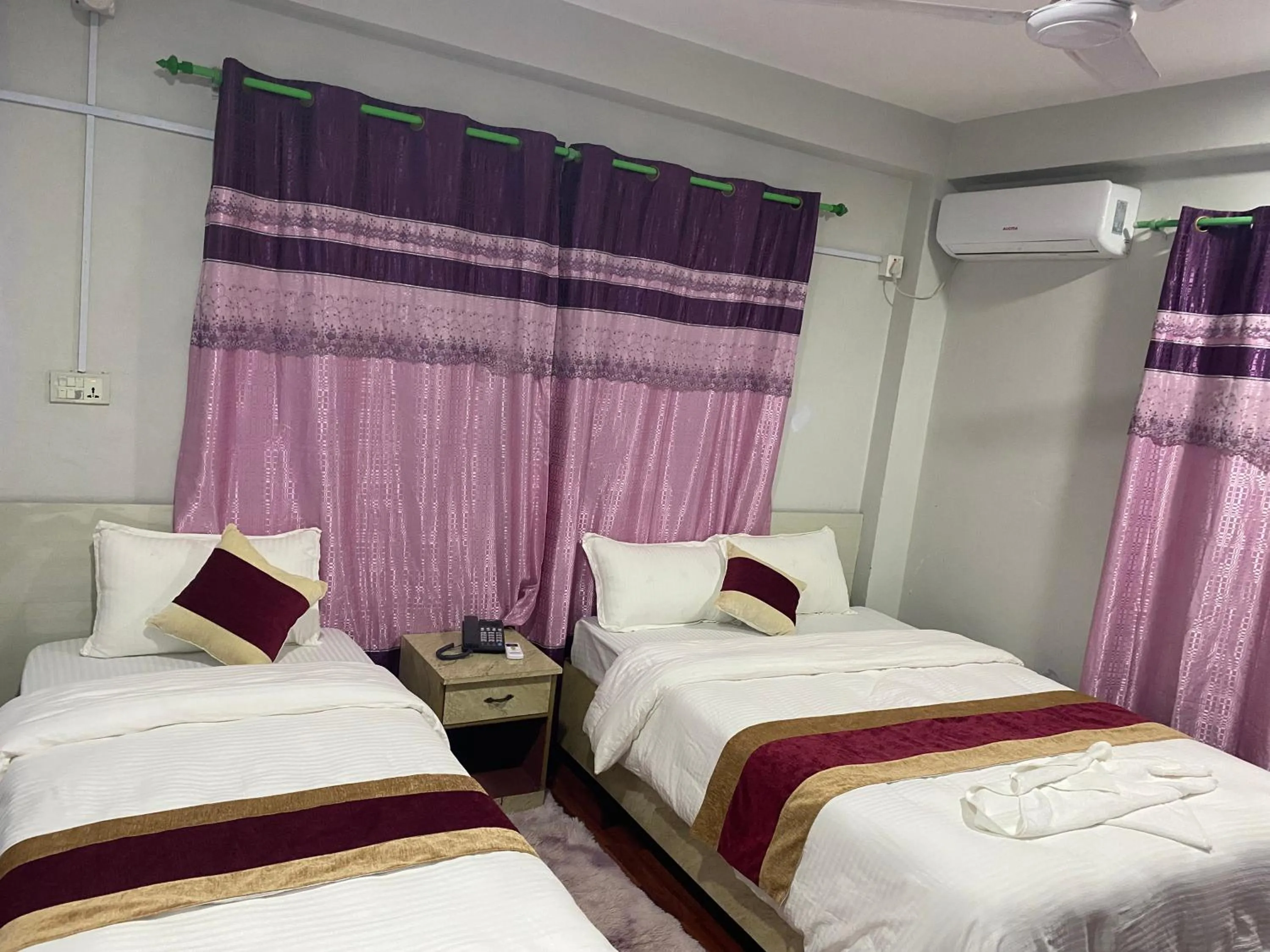 Bed in Hotel Kavya Inn