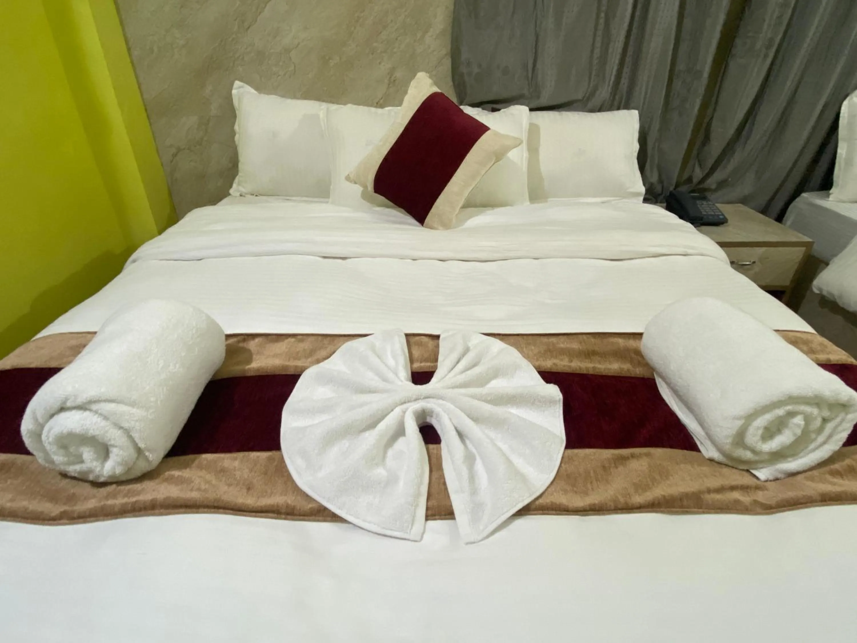 Bed in Hotel Kavya Inn