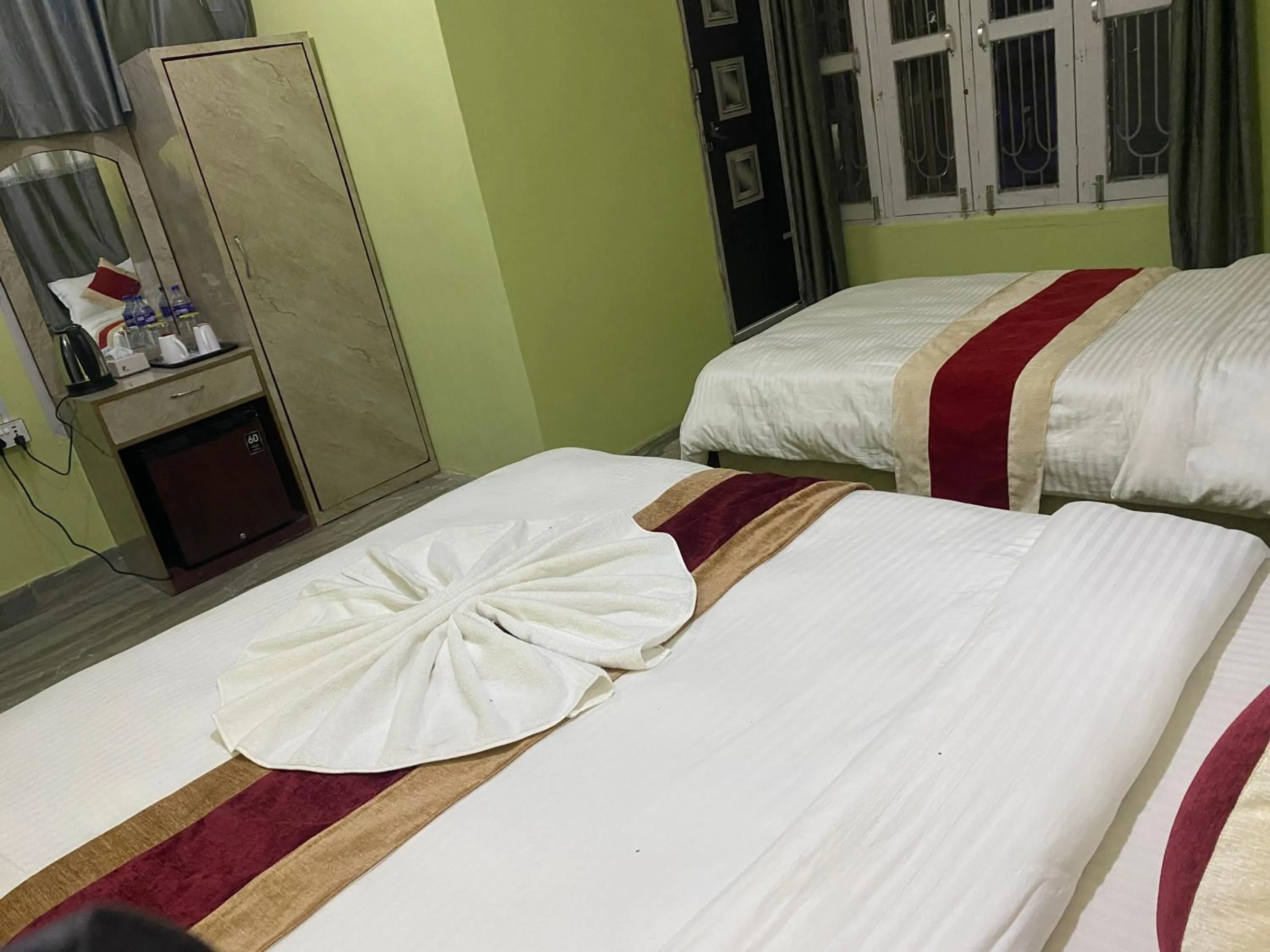Bed in Hotel Kavya Inn