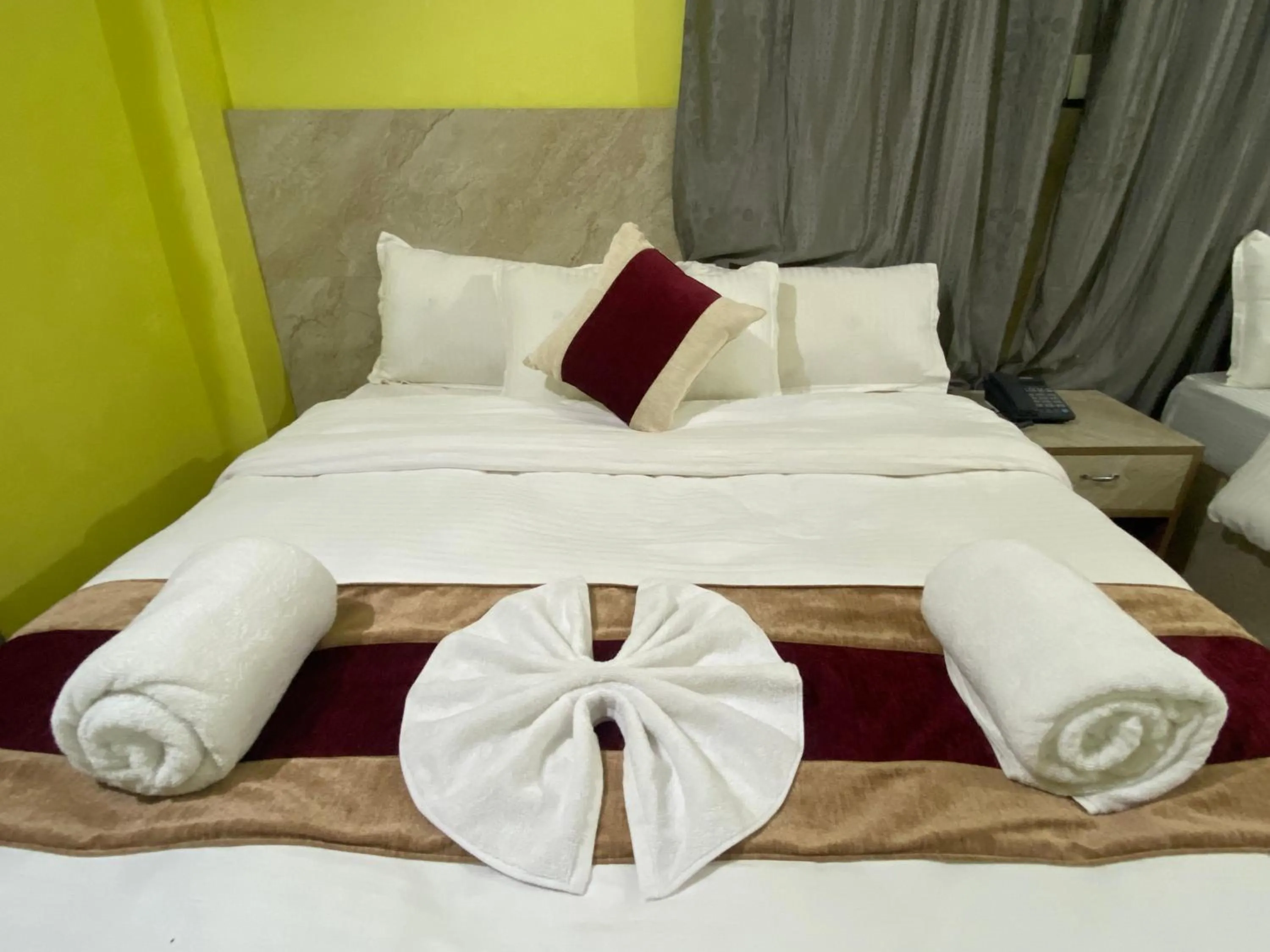 Bed in Hotel Kavya Inn
