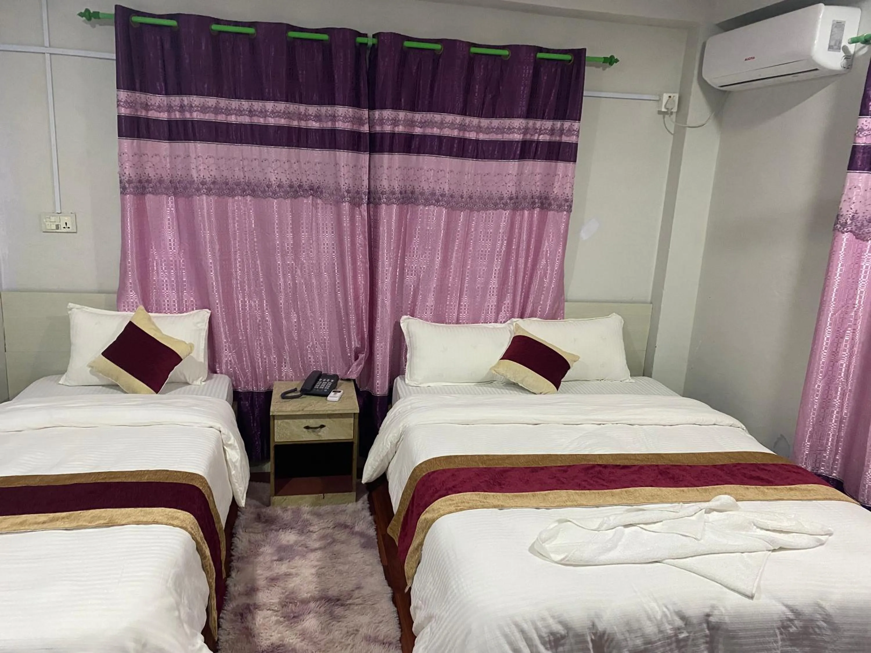 Bed in Hotel Kavya Inn