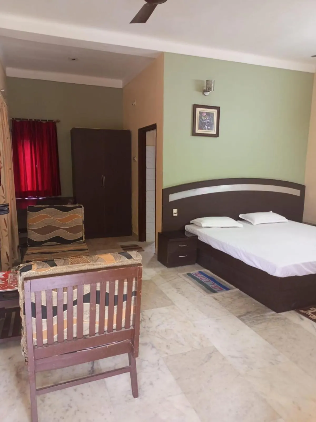 Living room, Bed in MADHUR RESIDENCY