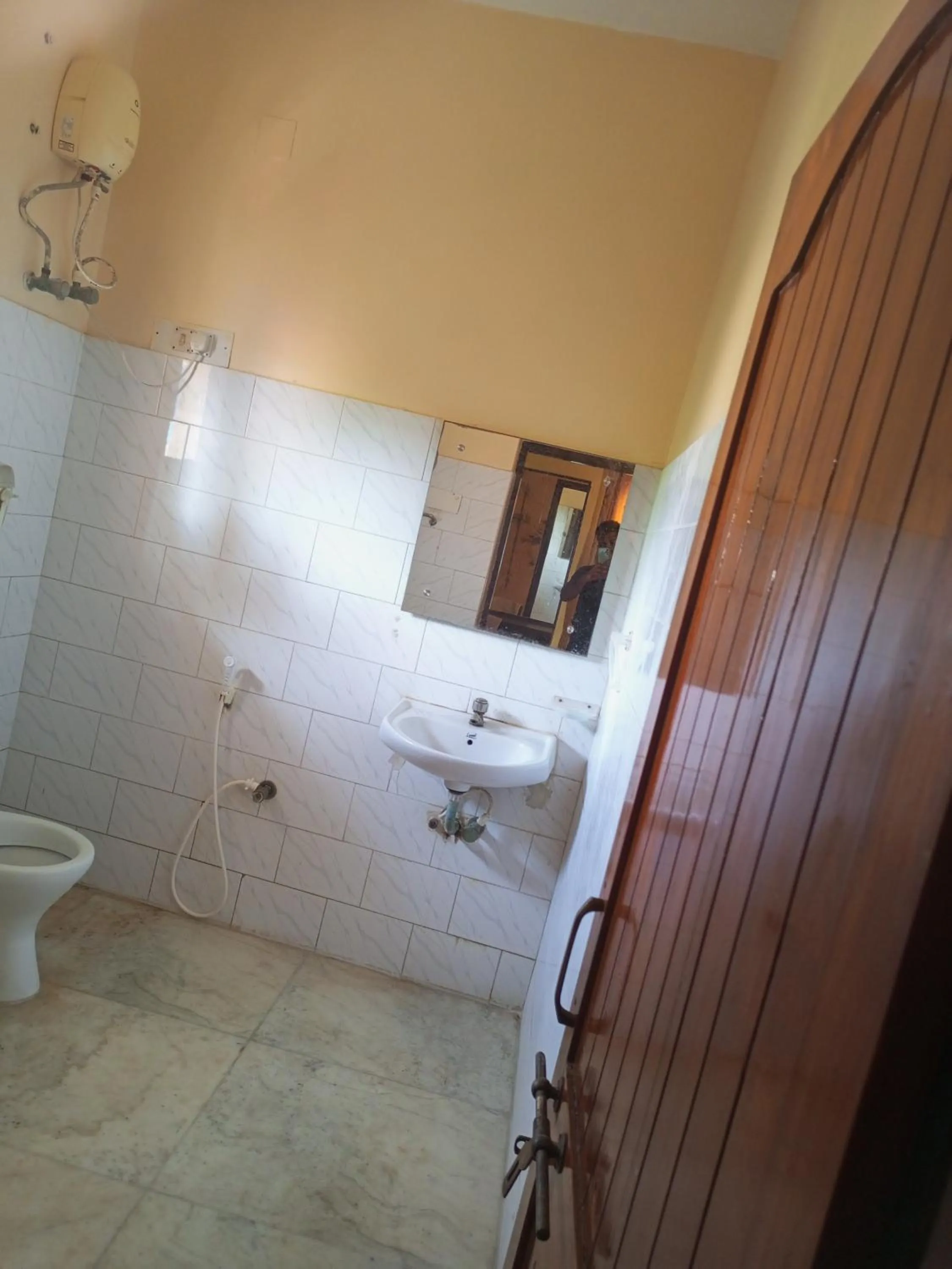 Toilet in MADHUR RESIDENCY