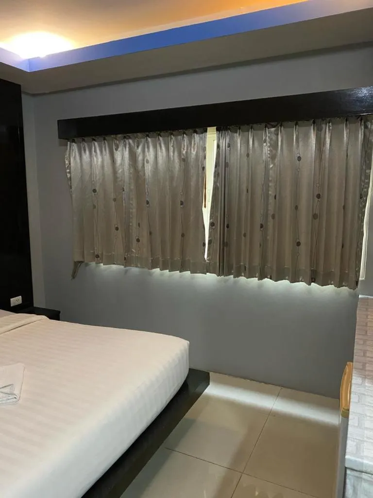 Bed in New Lavender Hotel Patong