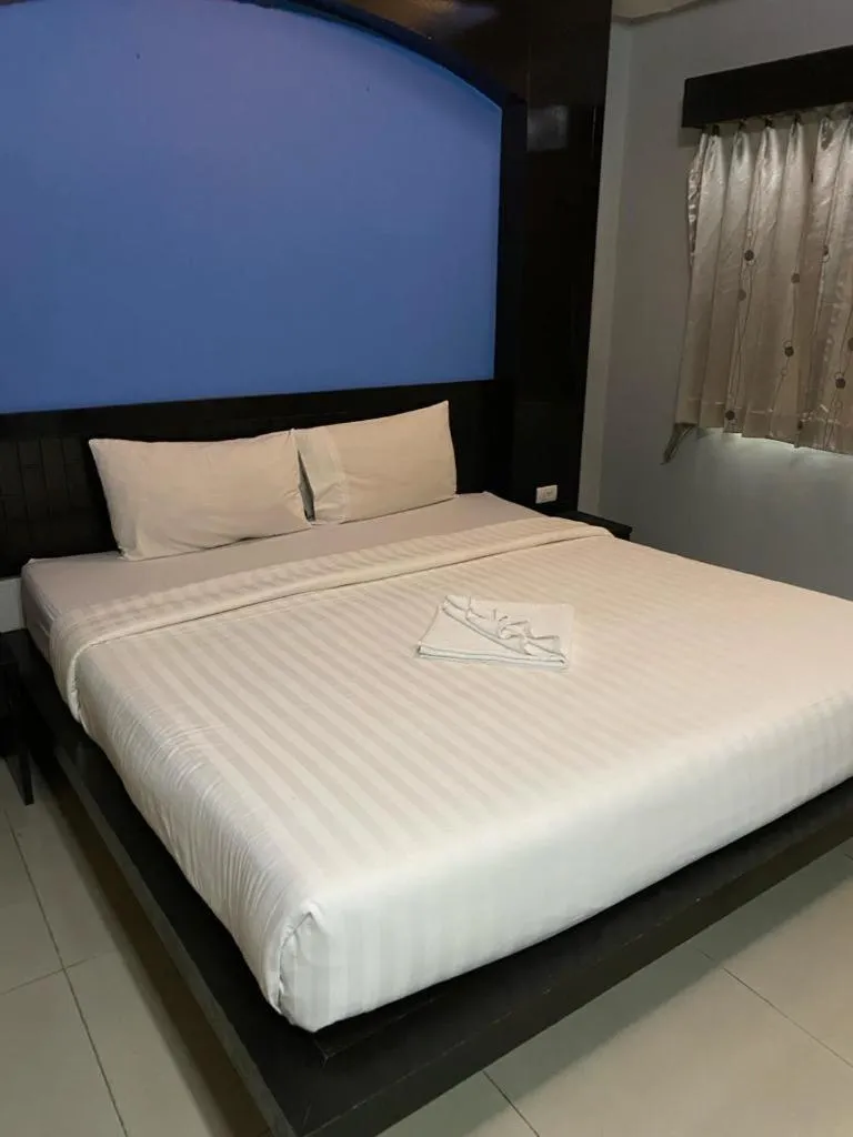 Bed in New Lavender Hotel Patong