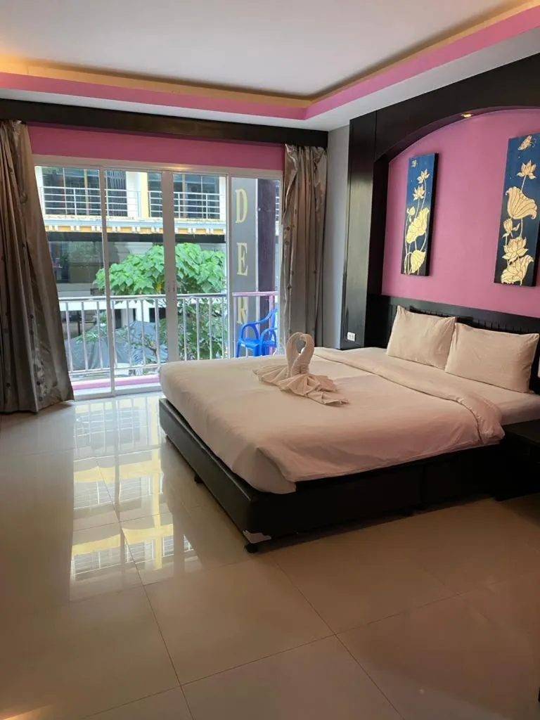 Bed in New Lavender Hotel Patong
