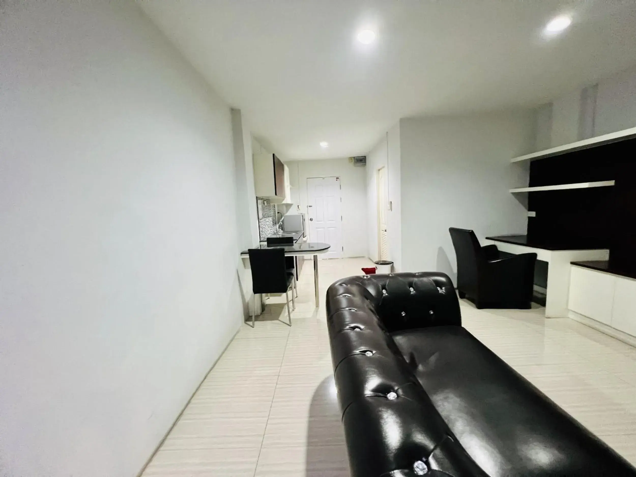 Living room in INN Kham Apartment Living room in INN Kham Apartment