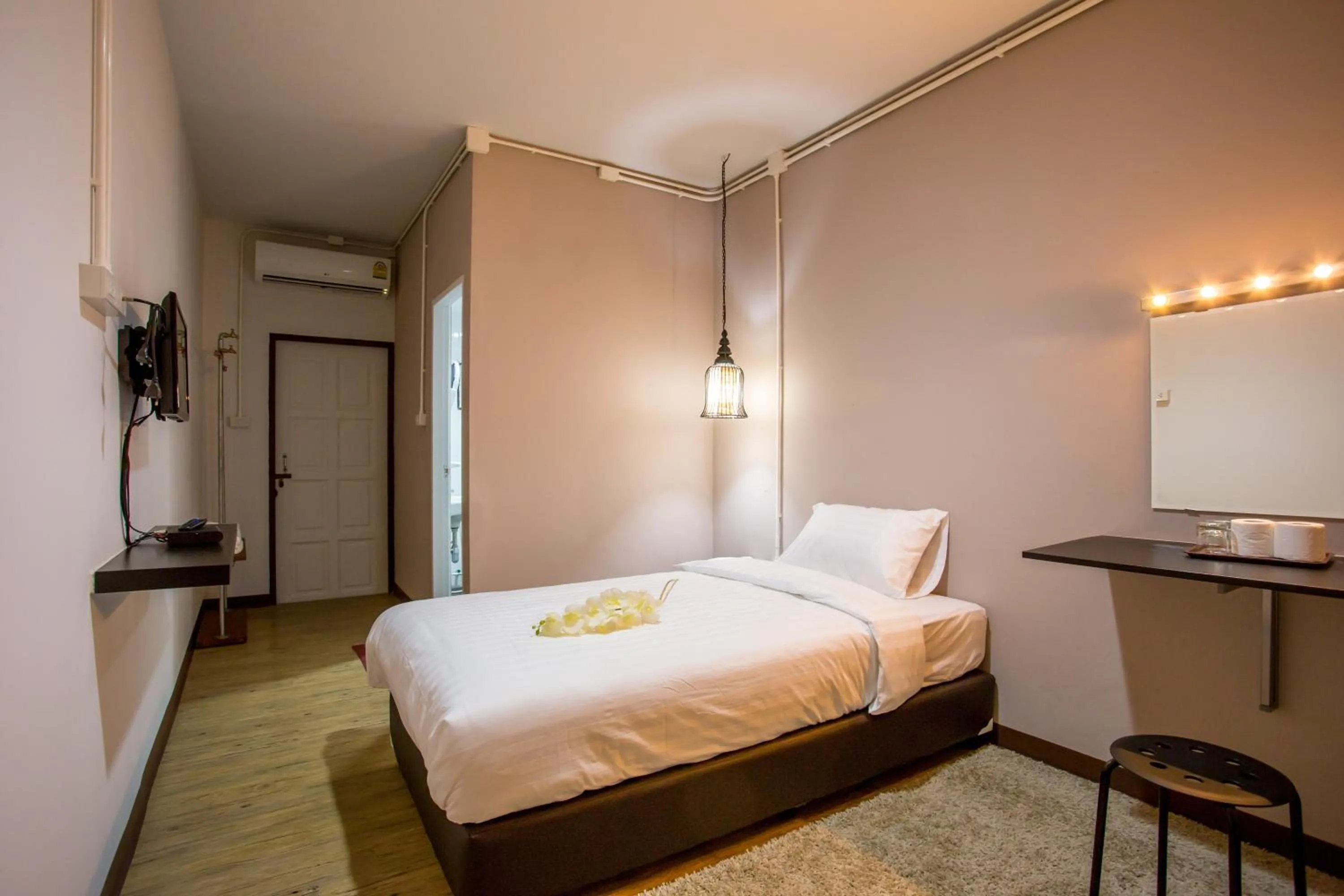 Photo of the whole room, Bed in First Residence