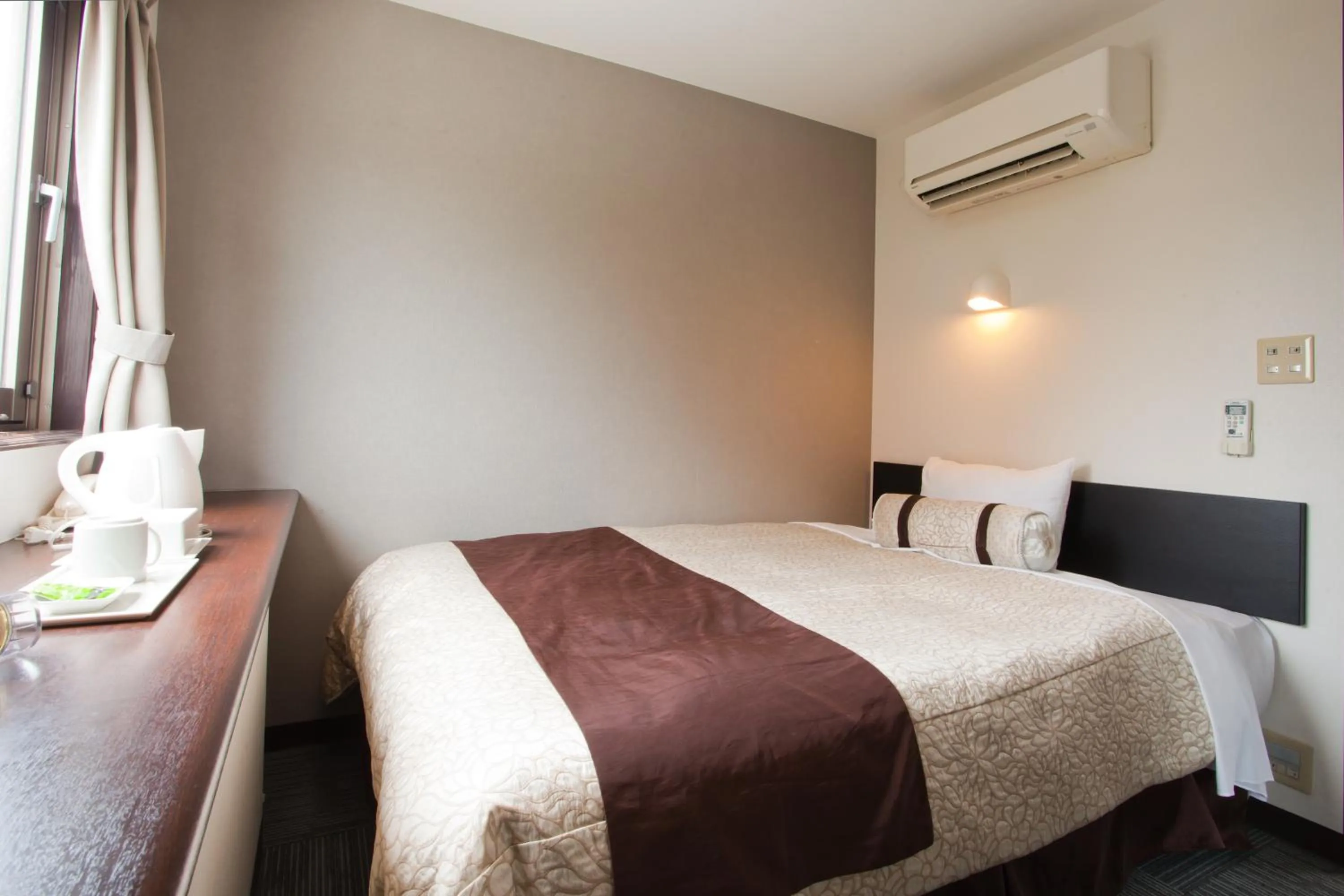 Bed in Kakegawa Station Hotel