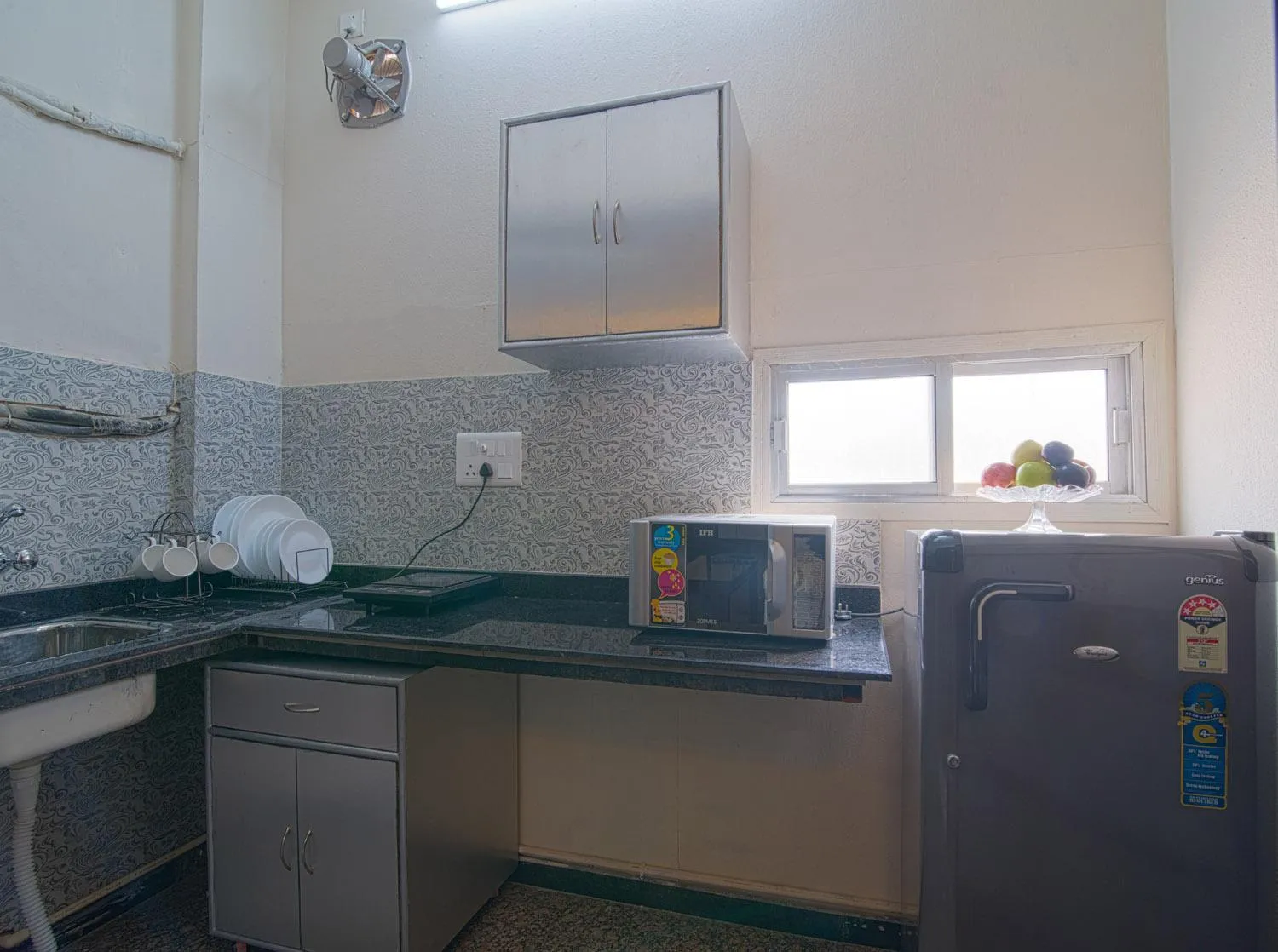 Kitchen or kitchenette in Perch Arbor Suites
