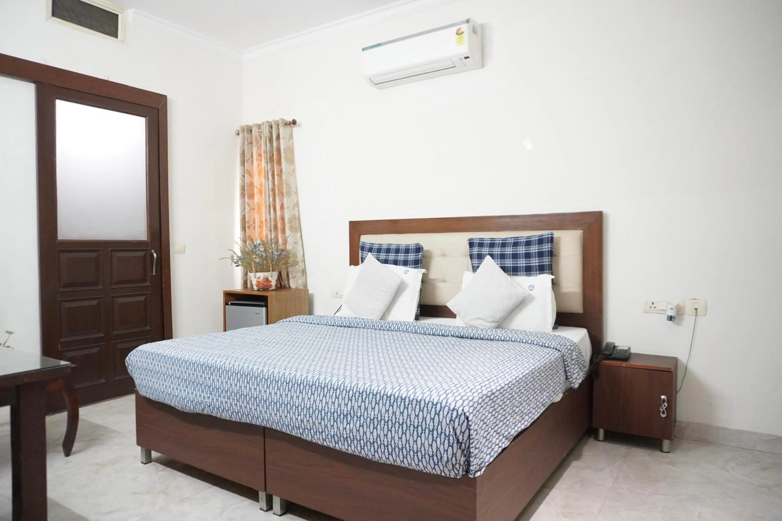 Bed in Perch Arbor Suites