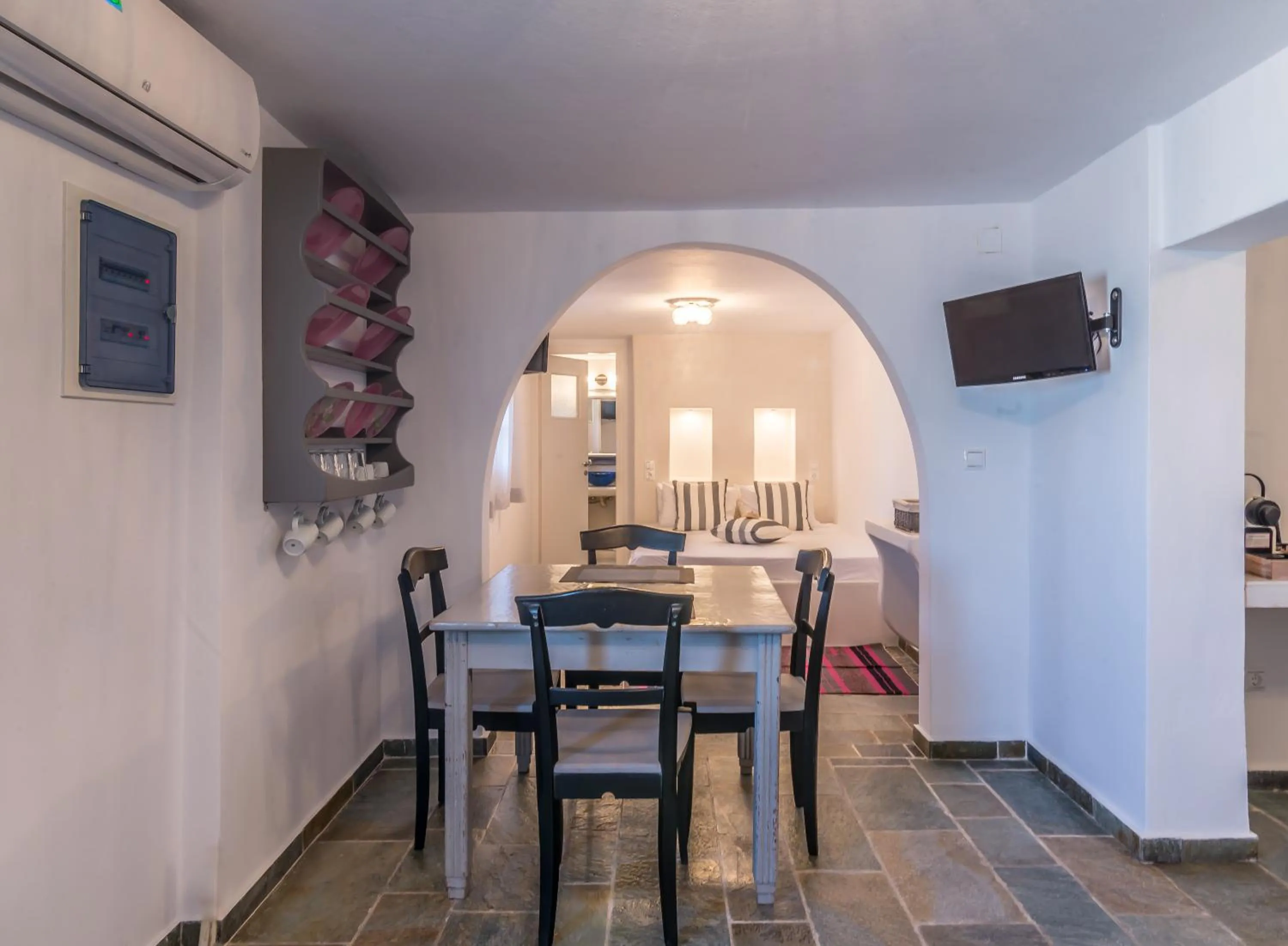 Bed in Eiriana Luxury Suites