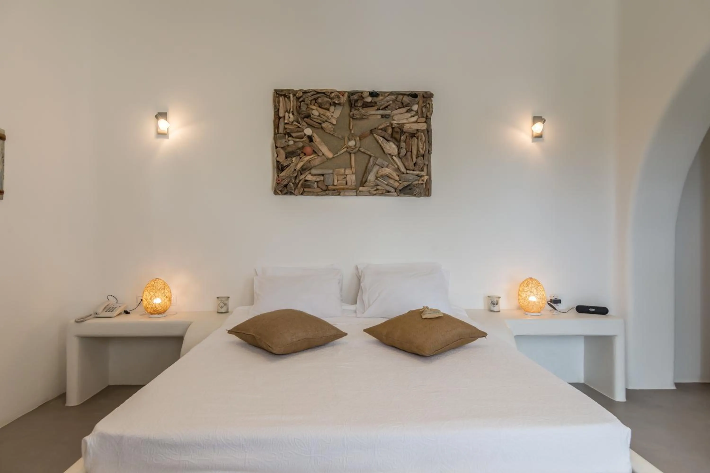 Bed in Eiriana Luxury Suites