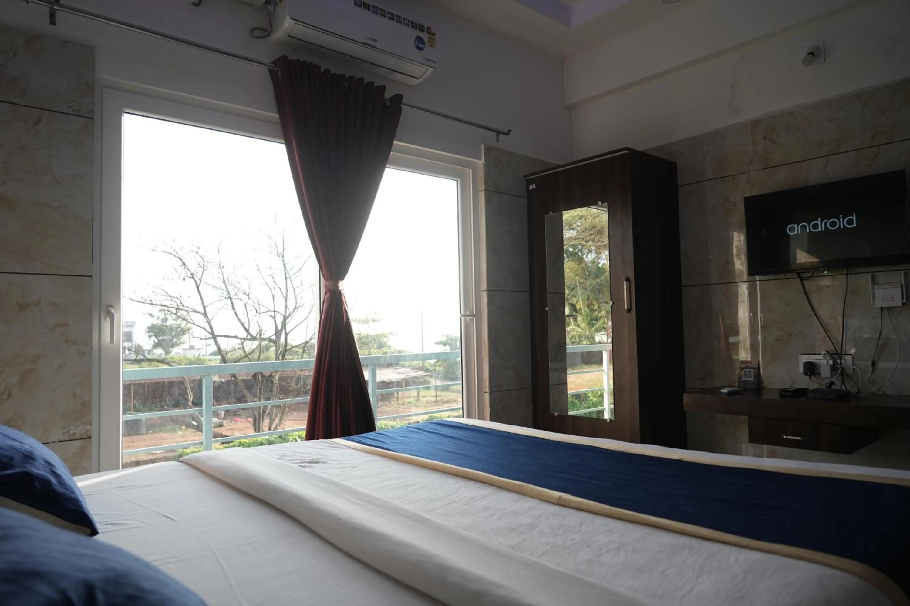 Bed in Blue Pearl Beach Guest House