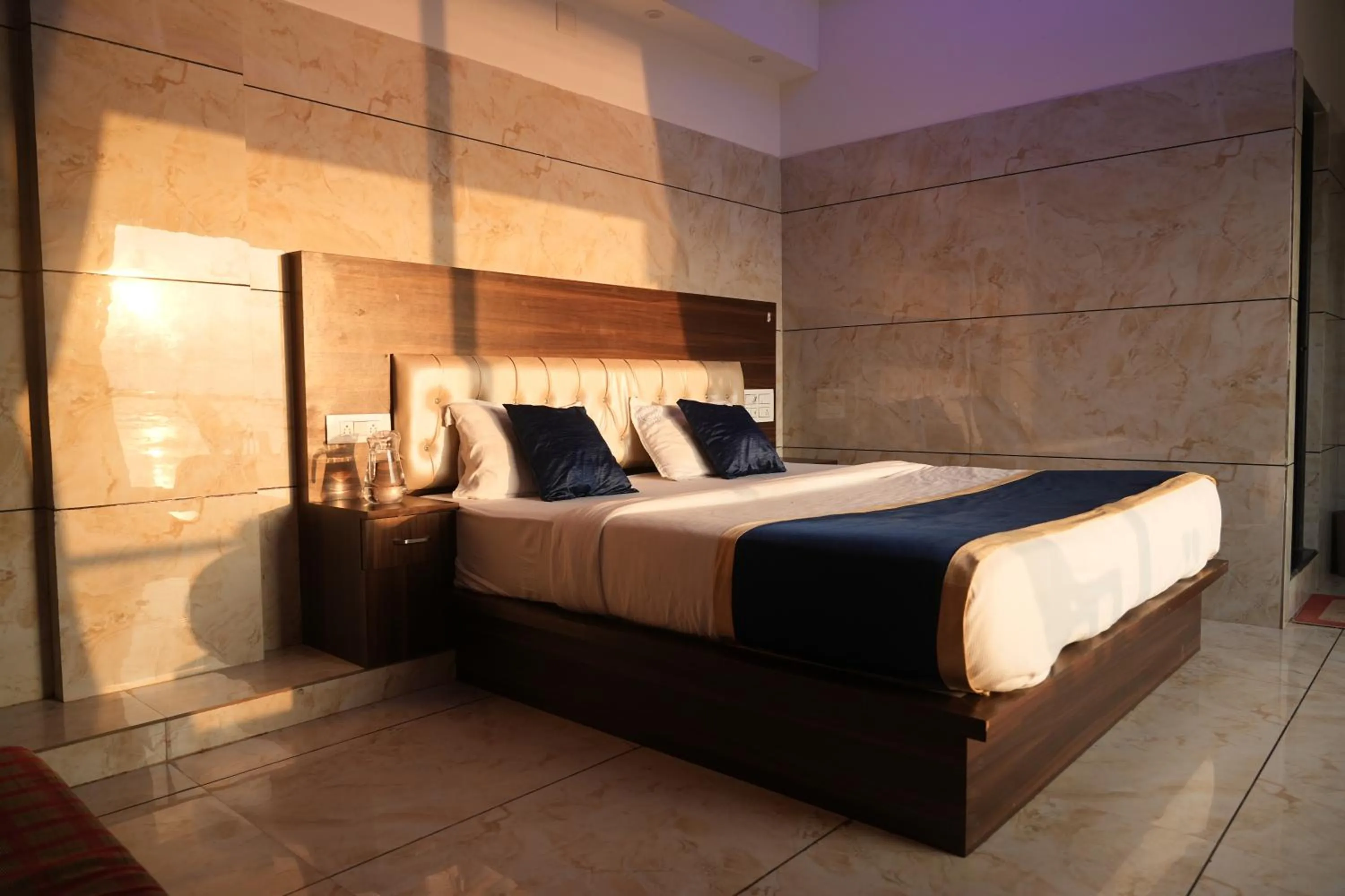 Bed in Blue Pearl Beach Guest House