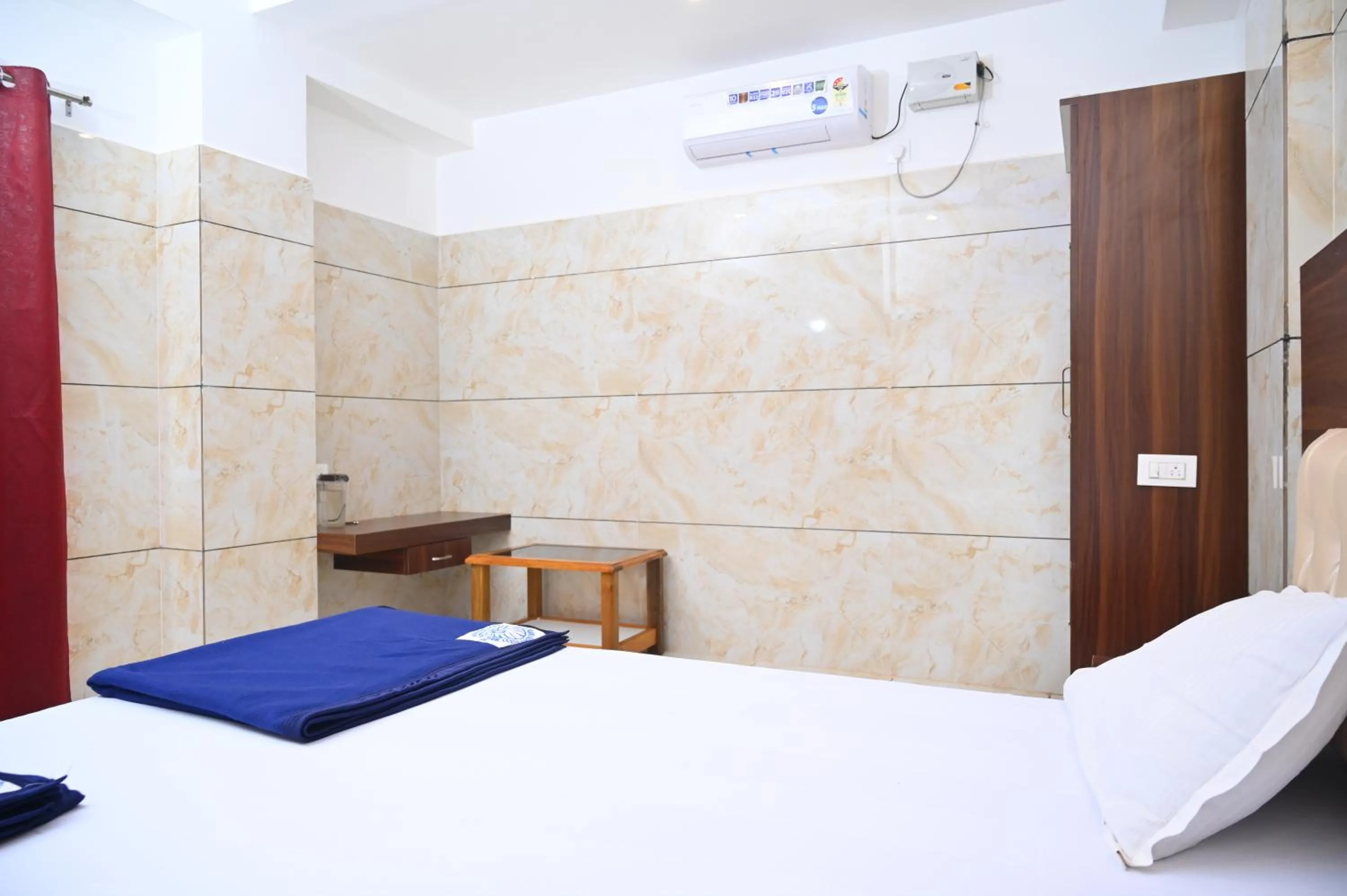 Bed in Blue Pearl Beach Guest House