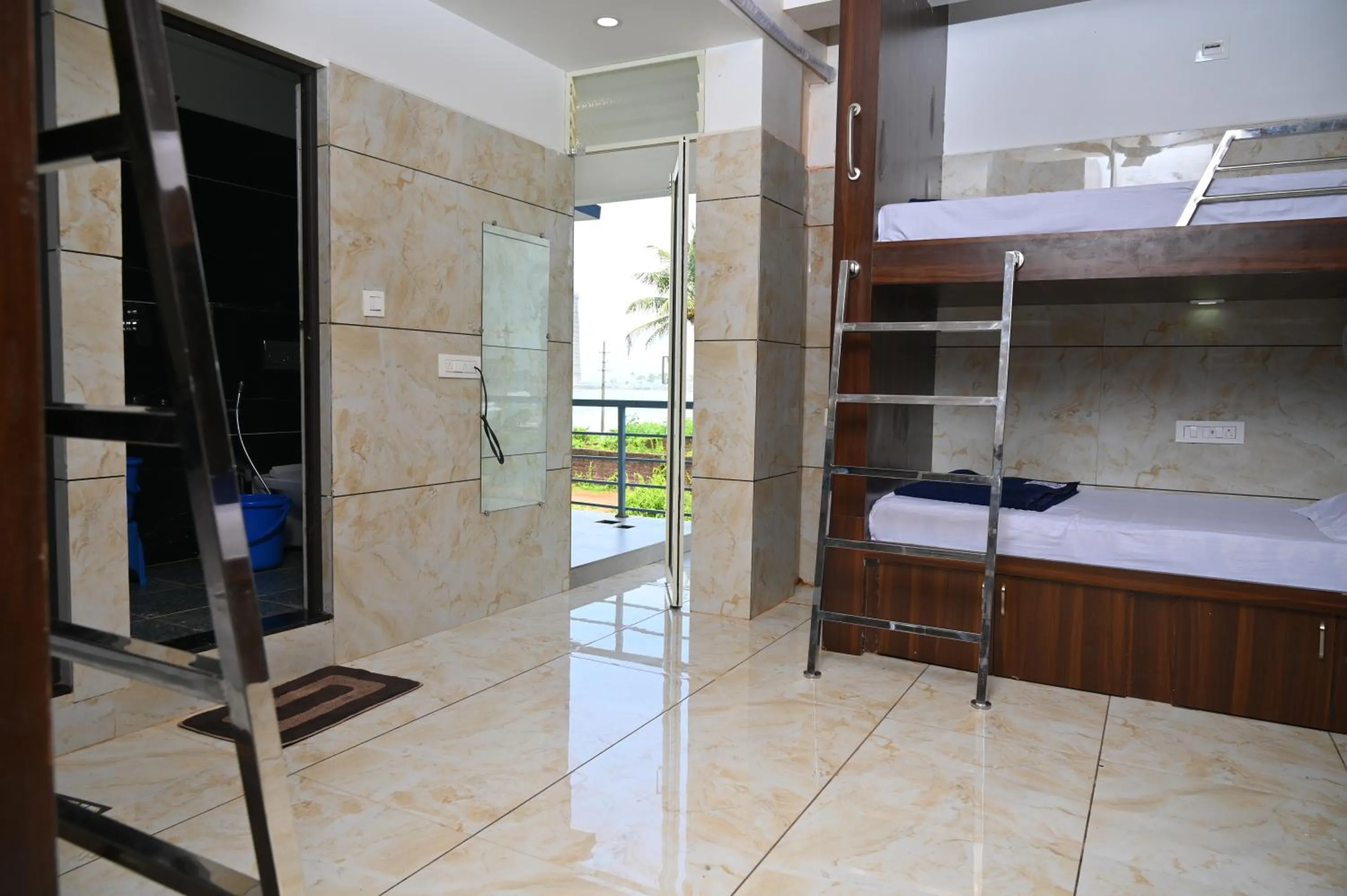 Bed in Blue Pearl Beach Guest House