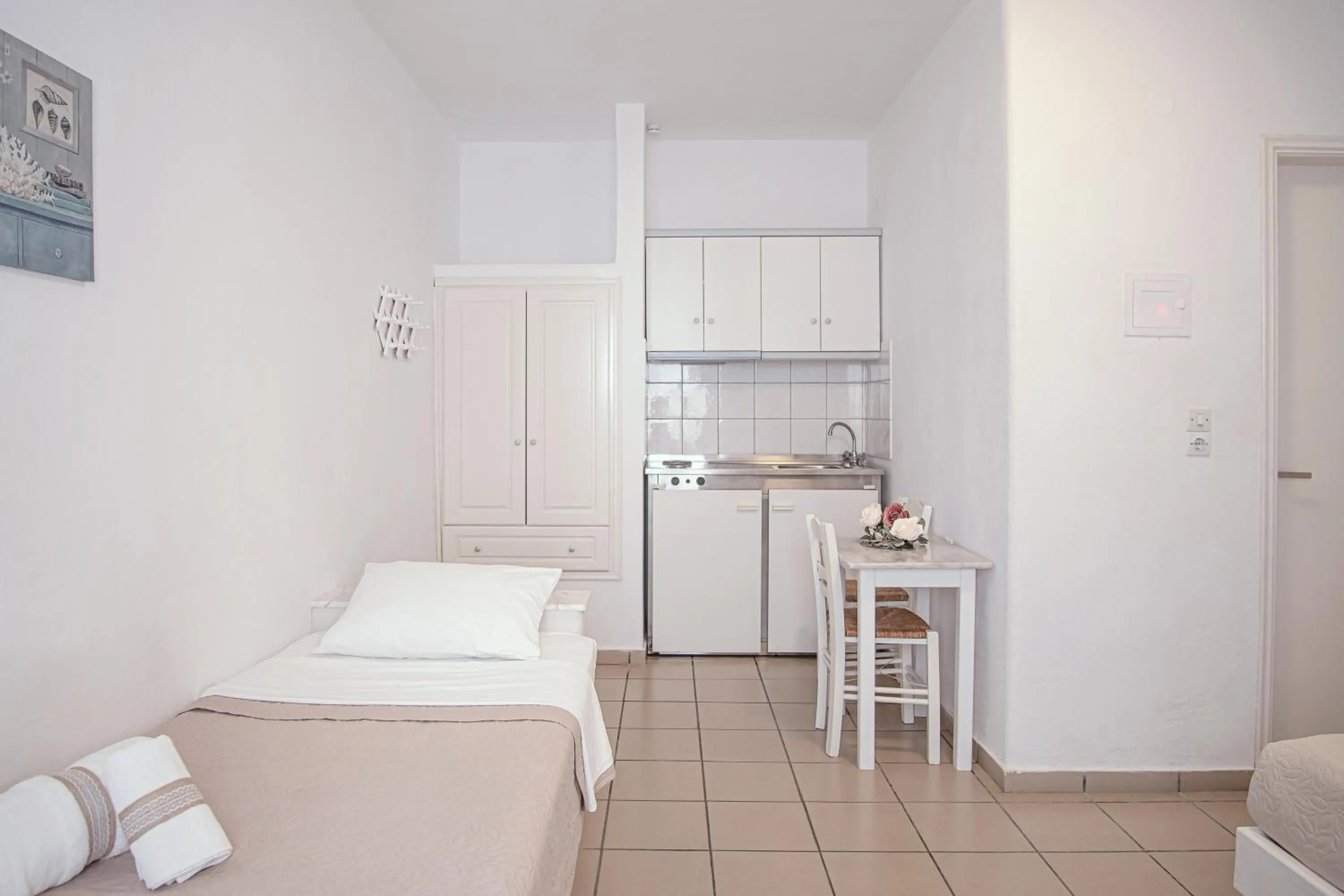 Bed in Kritikakis Village Hotel