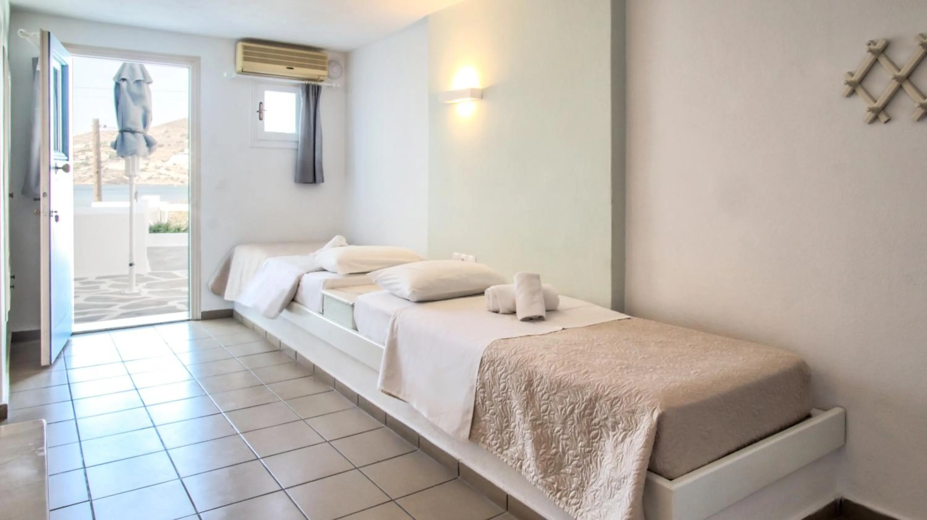 Bed in Kritikakis Village Hotel