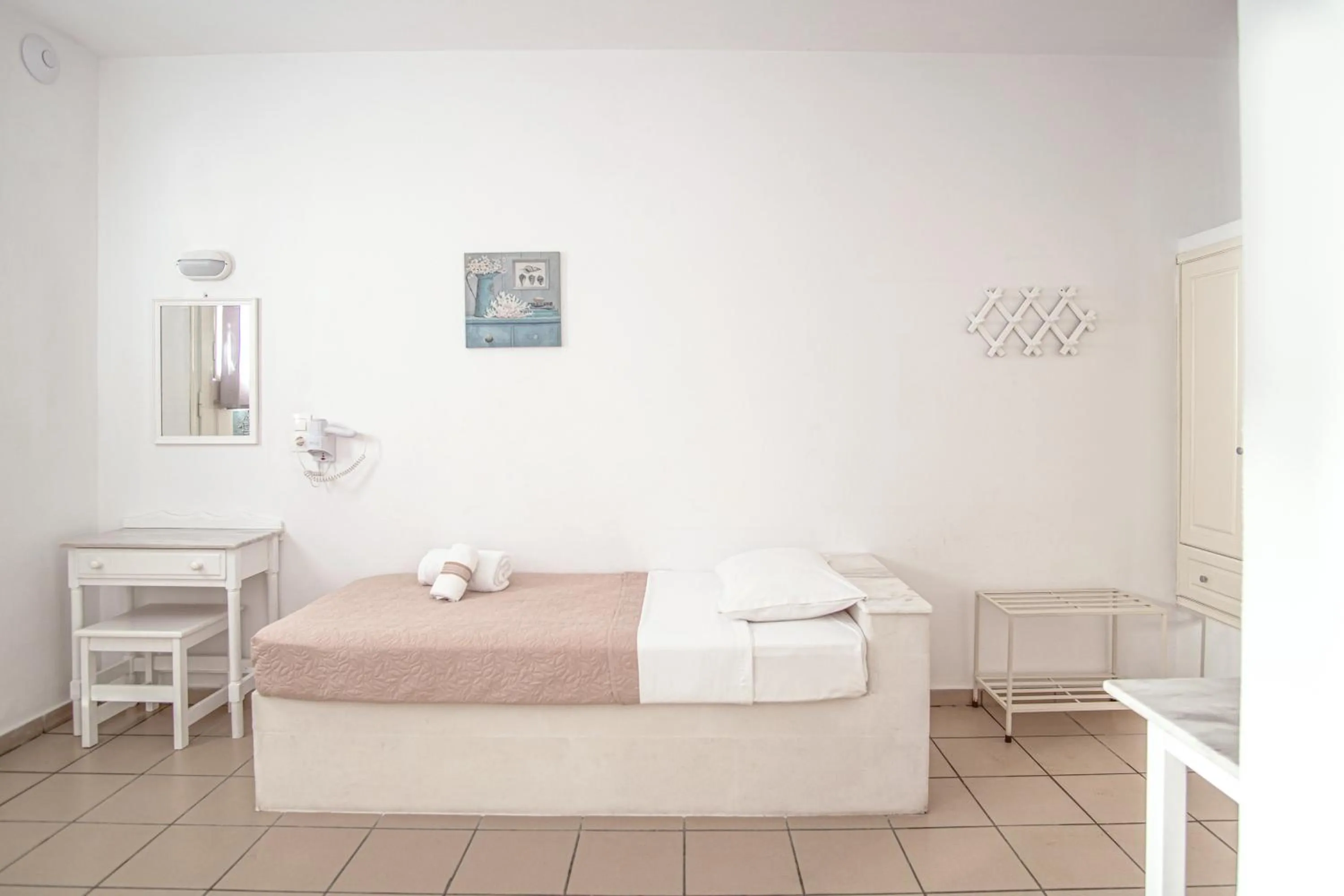 Bed in Kritikakis Village Hotel