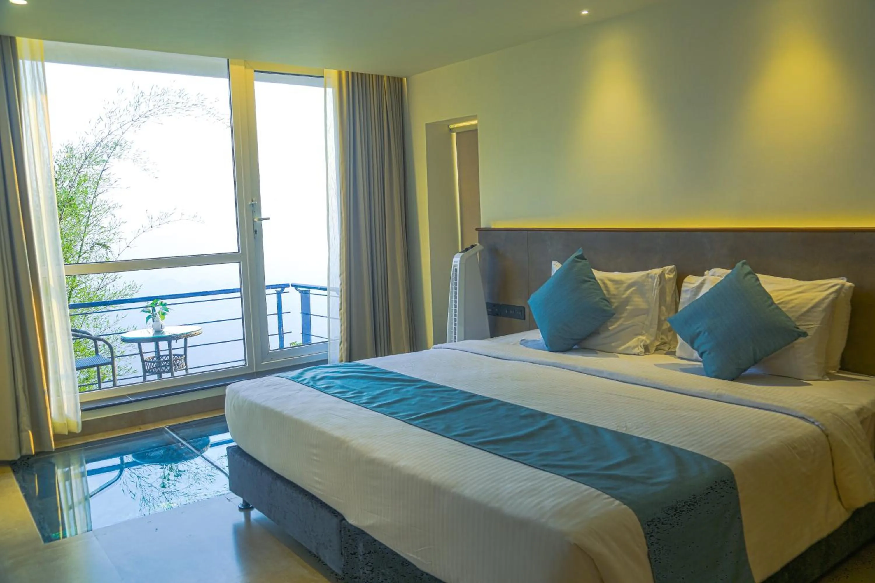 Bed in GReaT Trails Yercaud by GRT Hotels