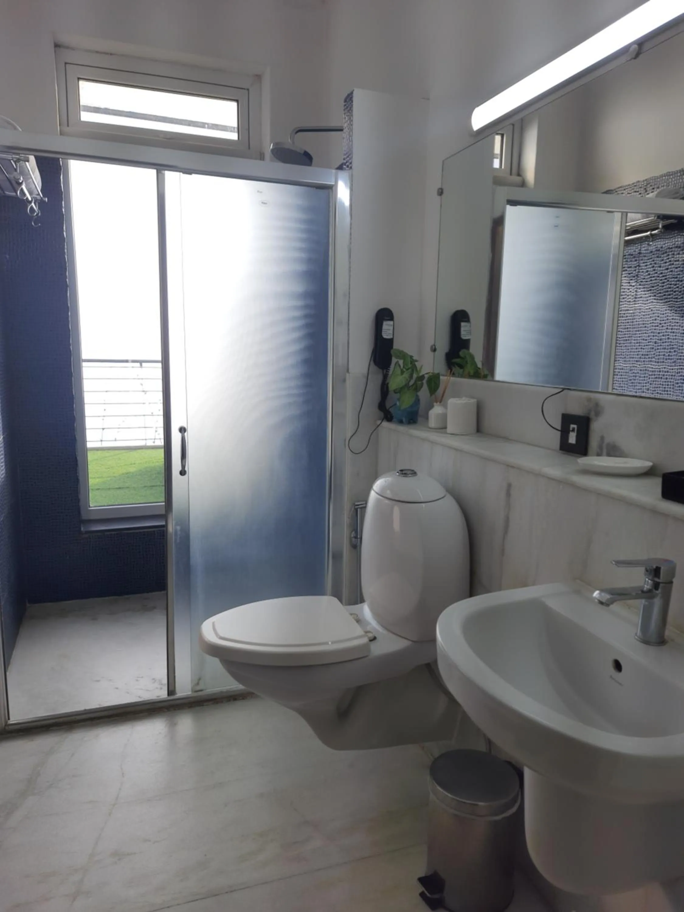 Bathroom in GReaT Trails Yercaud by GRT Hotels