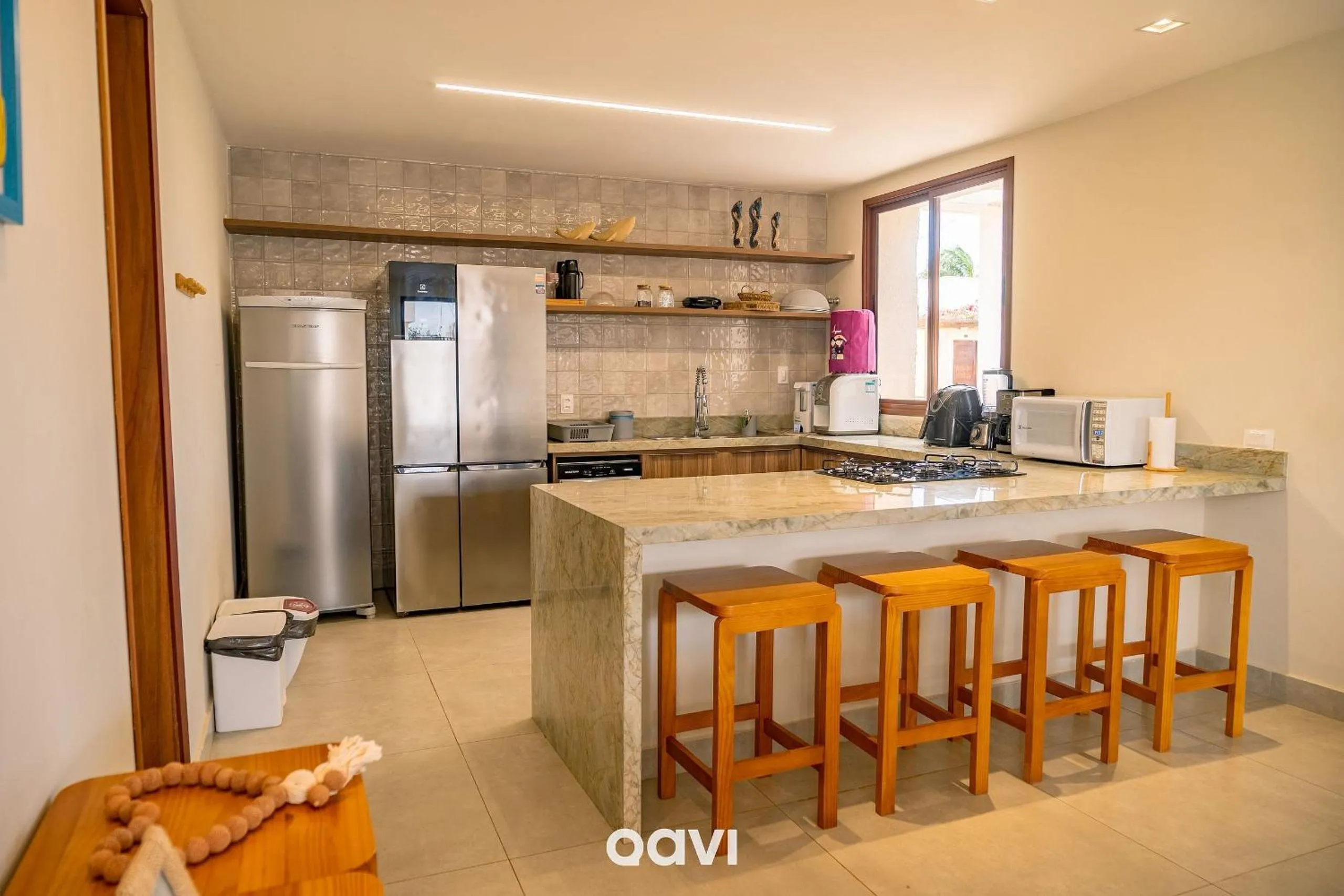 Kitchen or kitchenette in Villa Makani no Shamballa by Qavi