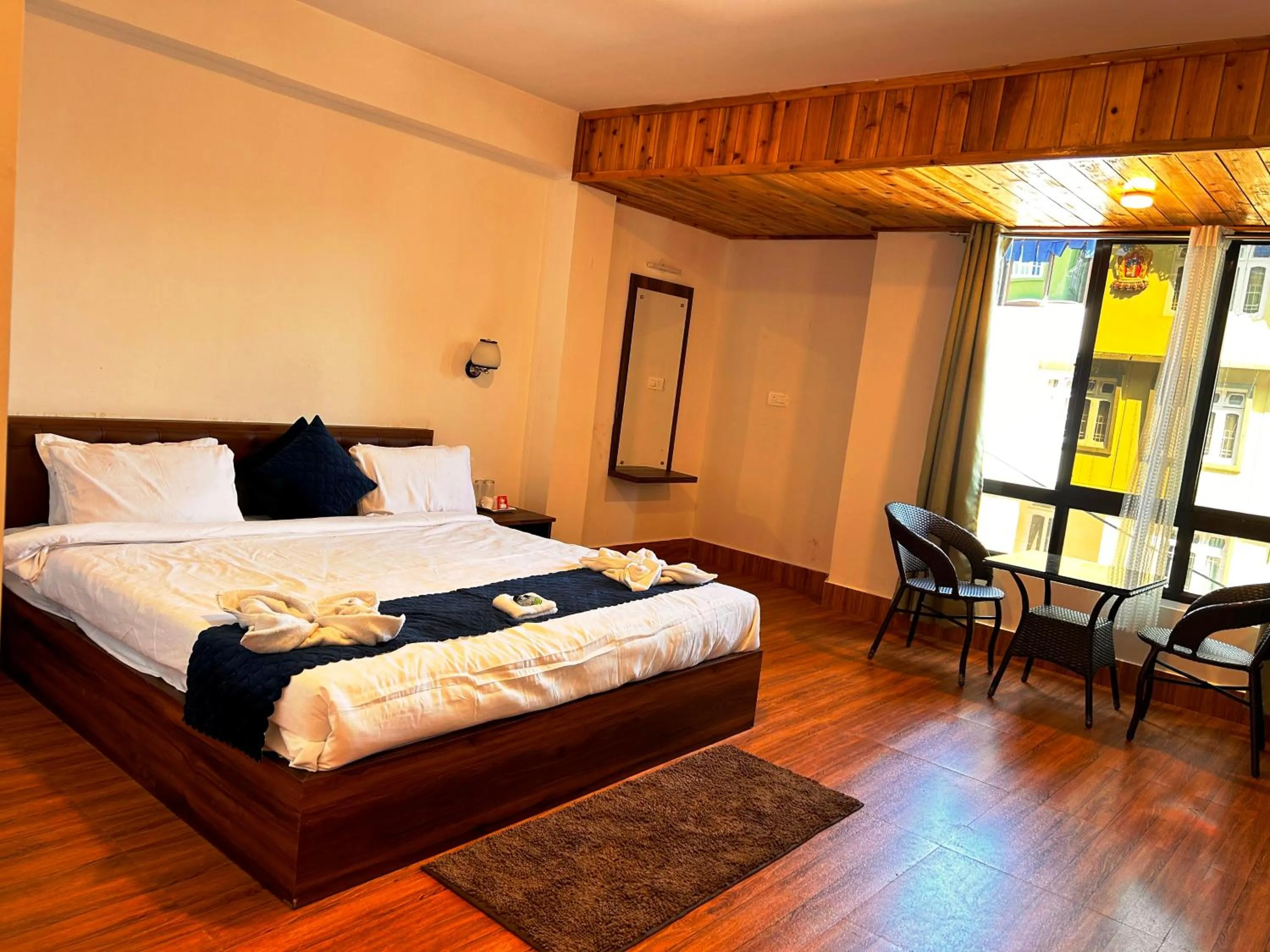 Living room, Bed in DISHA SILVER PEAK Hotel