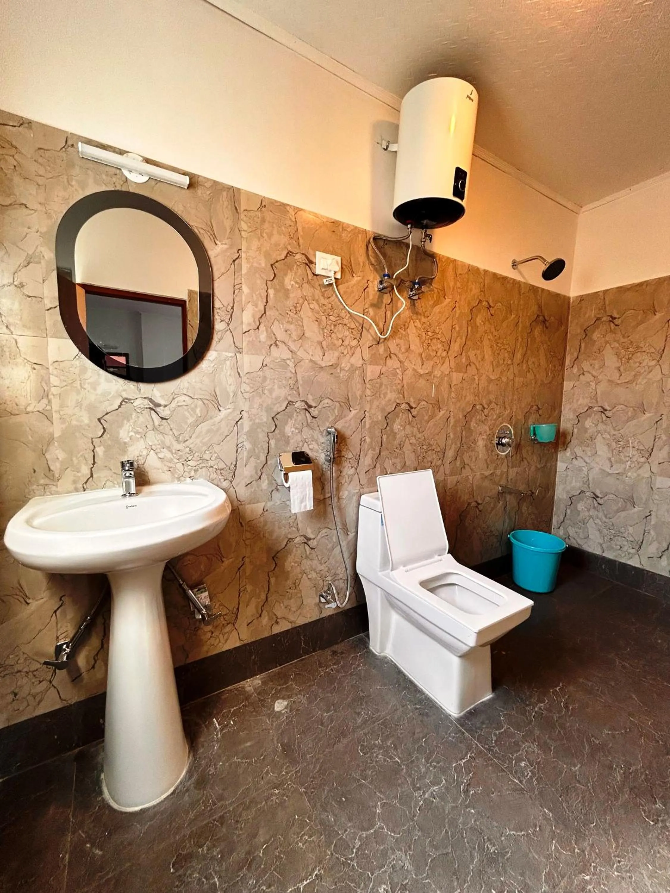 Bathroom in DISHA SILVER PEAK Hotel