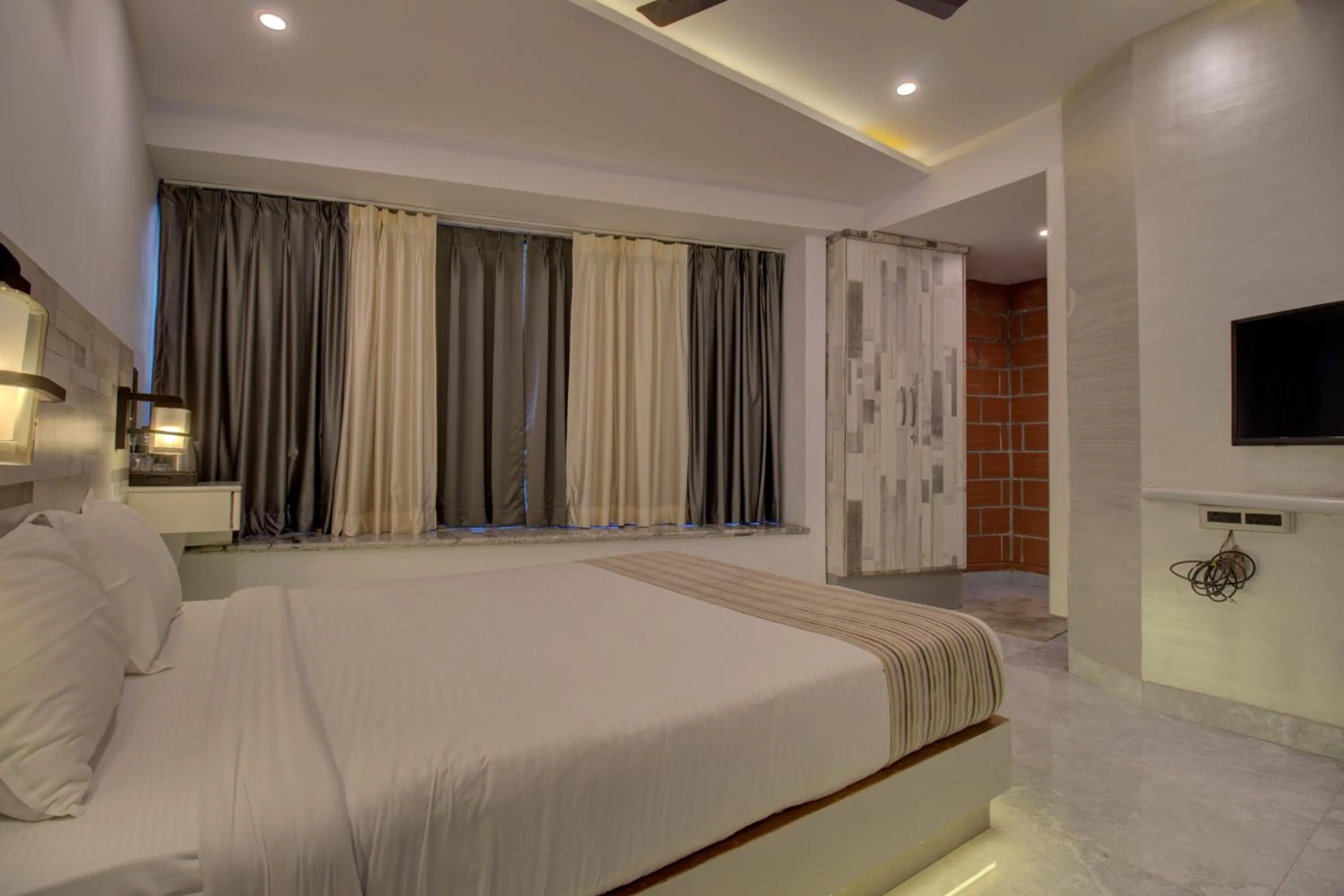Bed in Greenstones Boutique Hotel