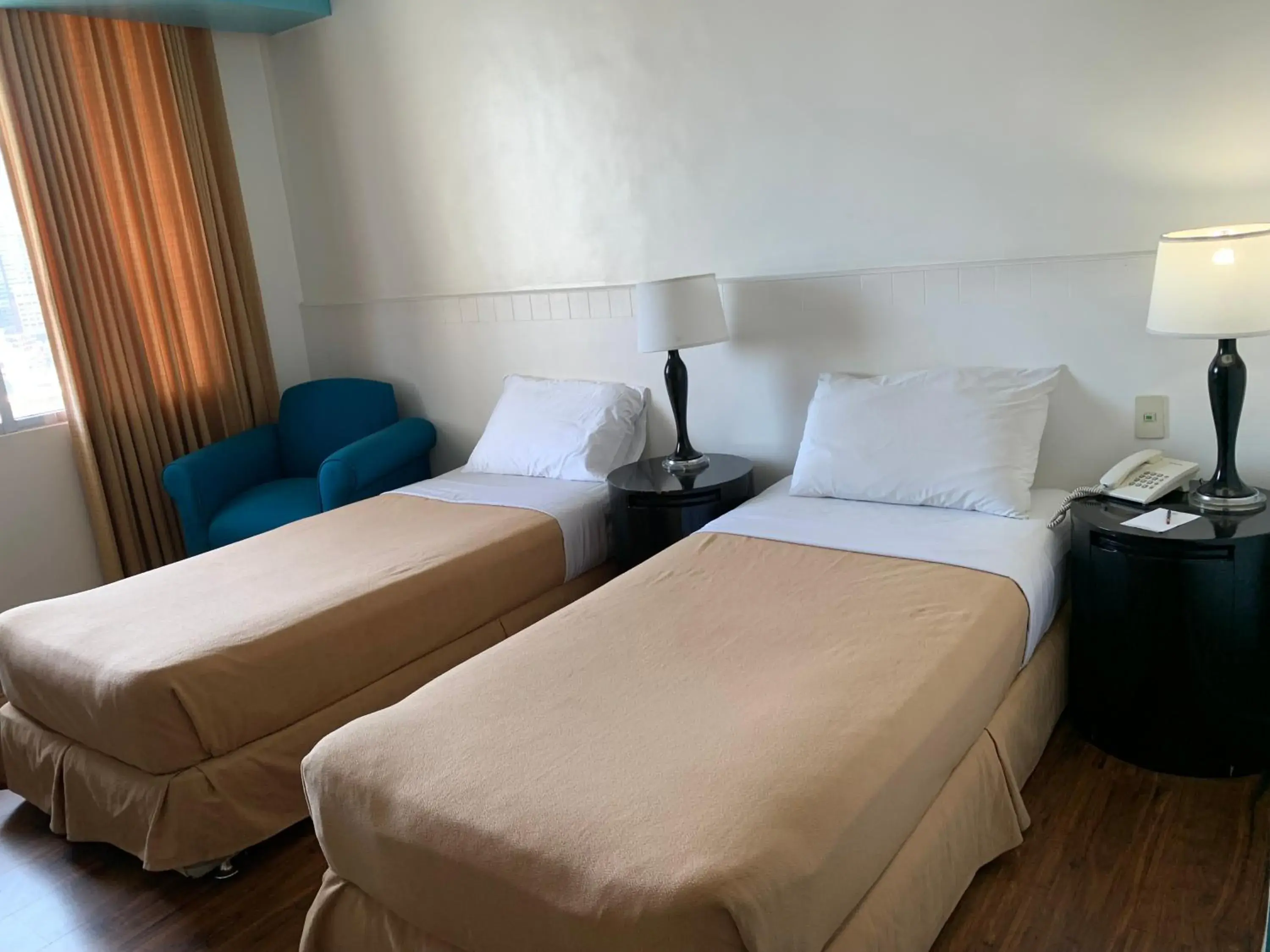 Bed in Pearl Manila Hotel Bed in Pearl Manila Hotel