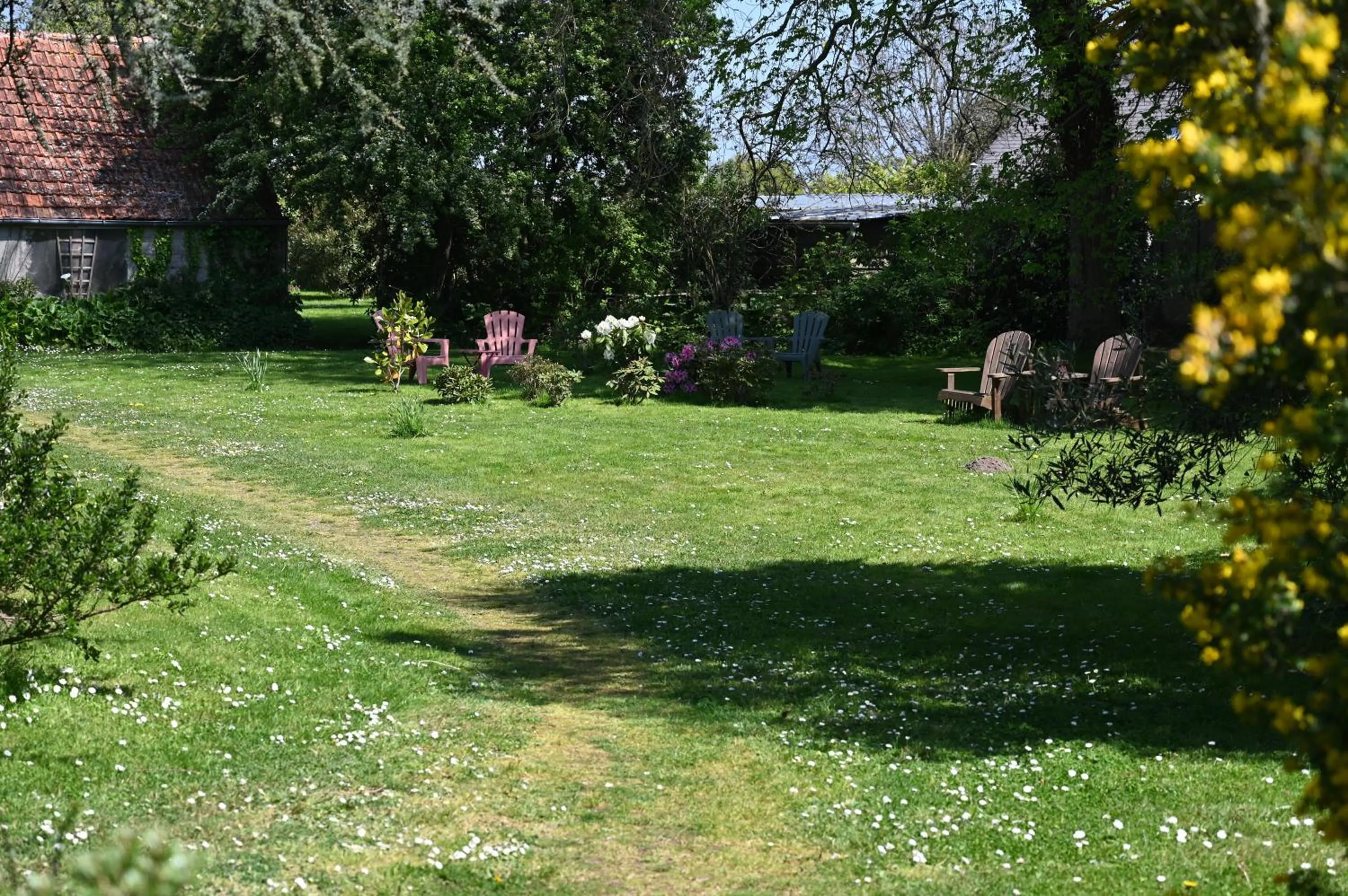 Garden in Logis Hôtel La Demeure du Perron
