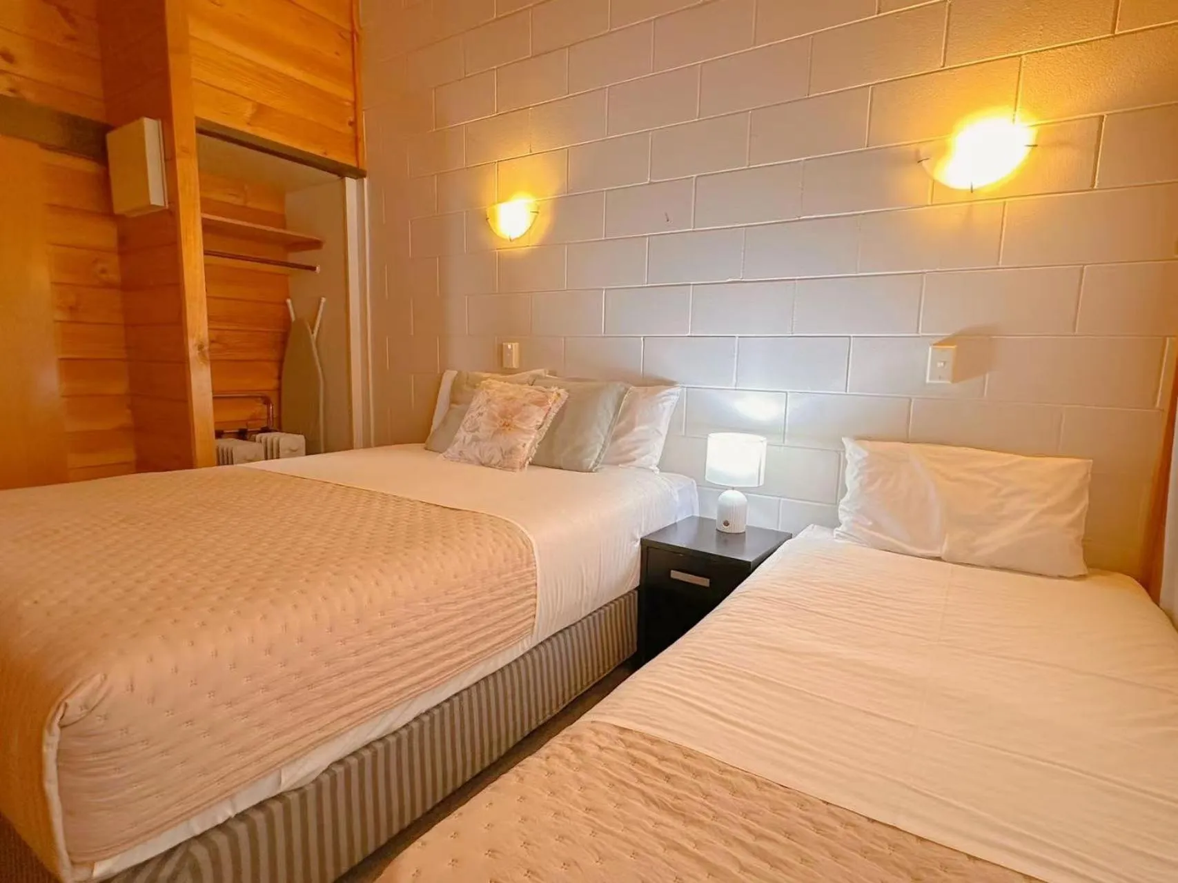 Bed in Orewa Motor Lodge