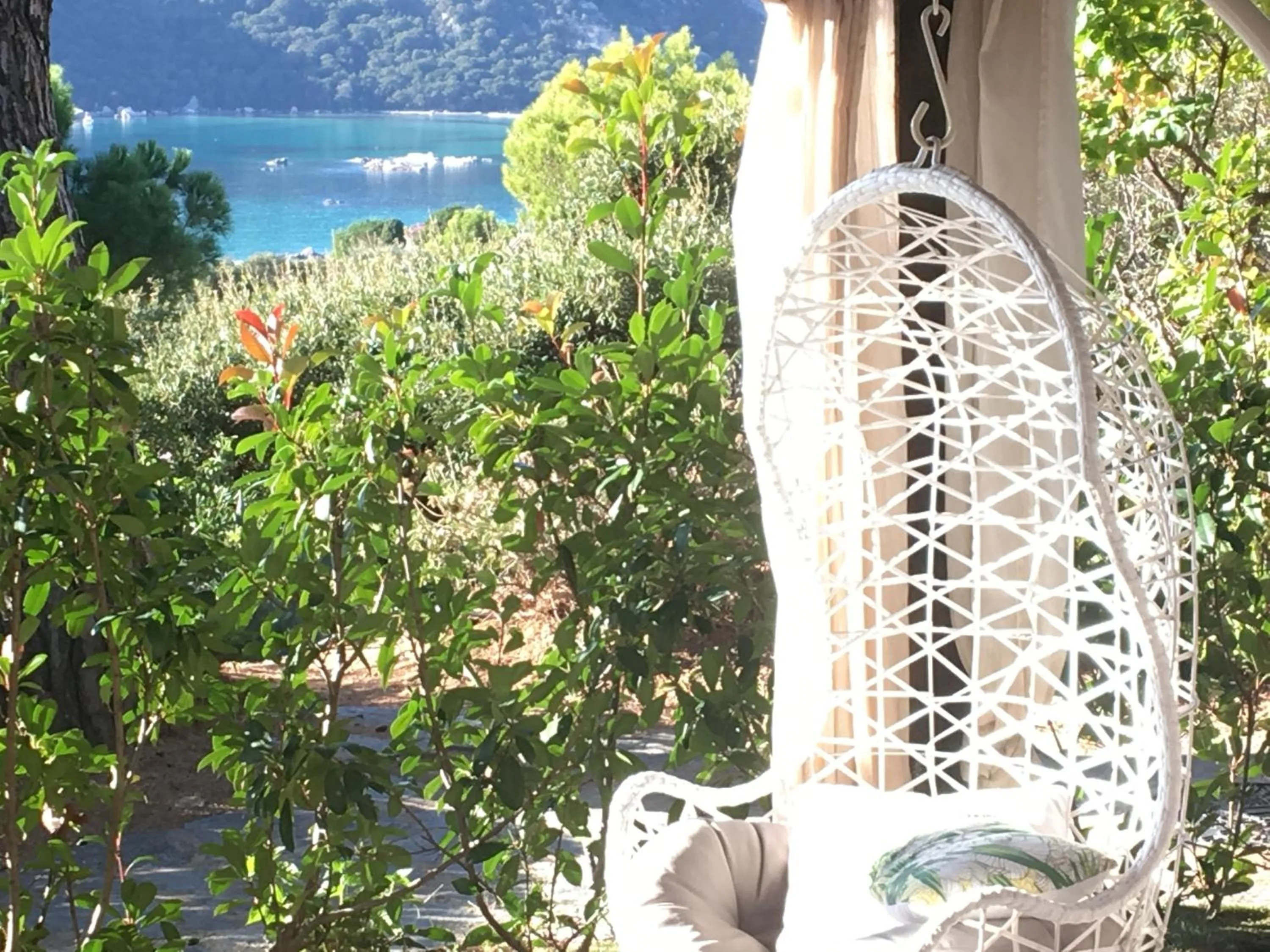 Patio in Residence Bellavista à Santa Giulia, proche de la plage et vue mer