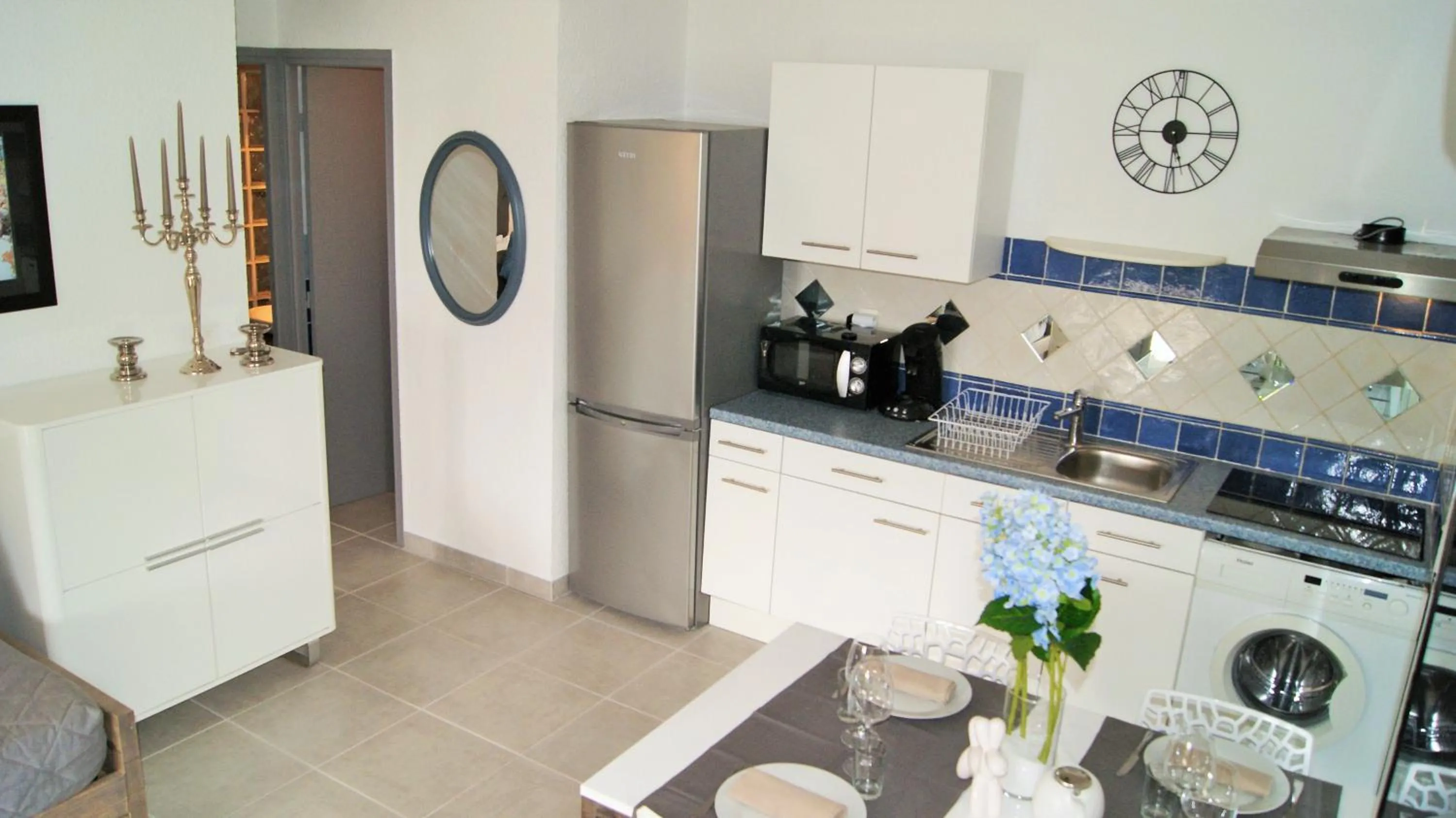 Kitchen or kitchenette in Residence Bellavista à Santa Giulia, proche de la plage et vue mer