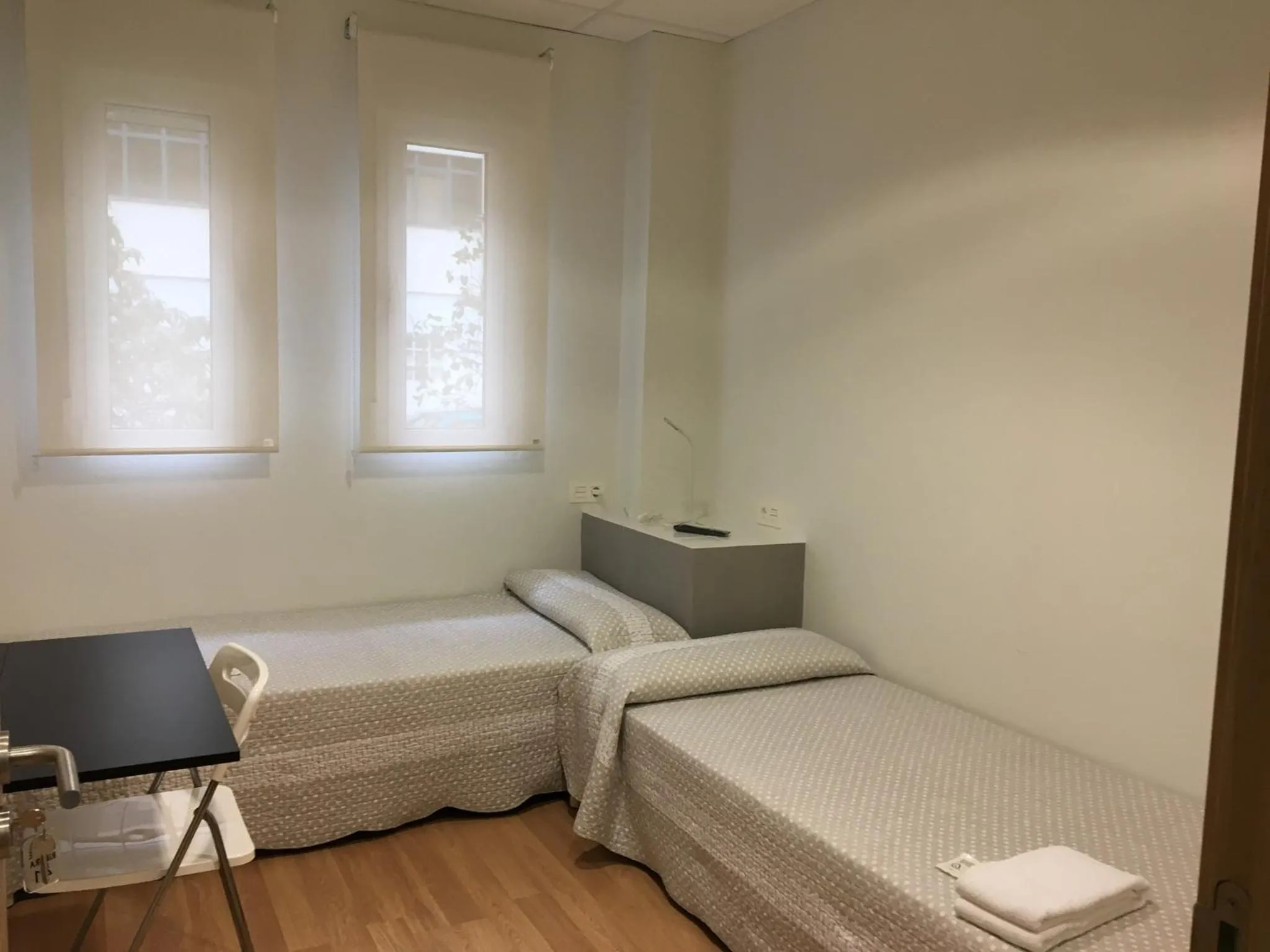 Bed in Pensión-Albergue Puente Ribeira