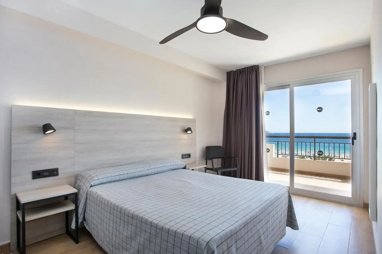 Bed in Apartamentos Odysea By Apartamentos Valentia