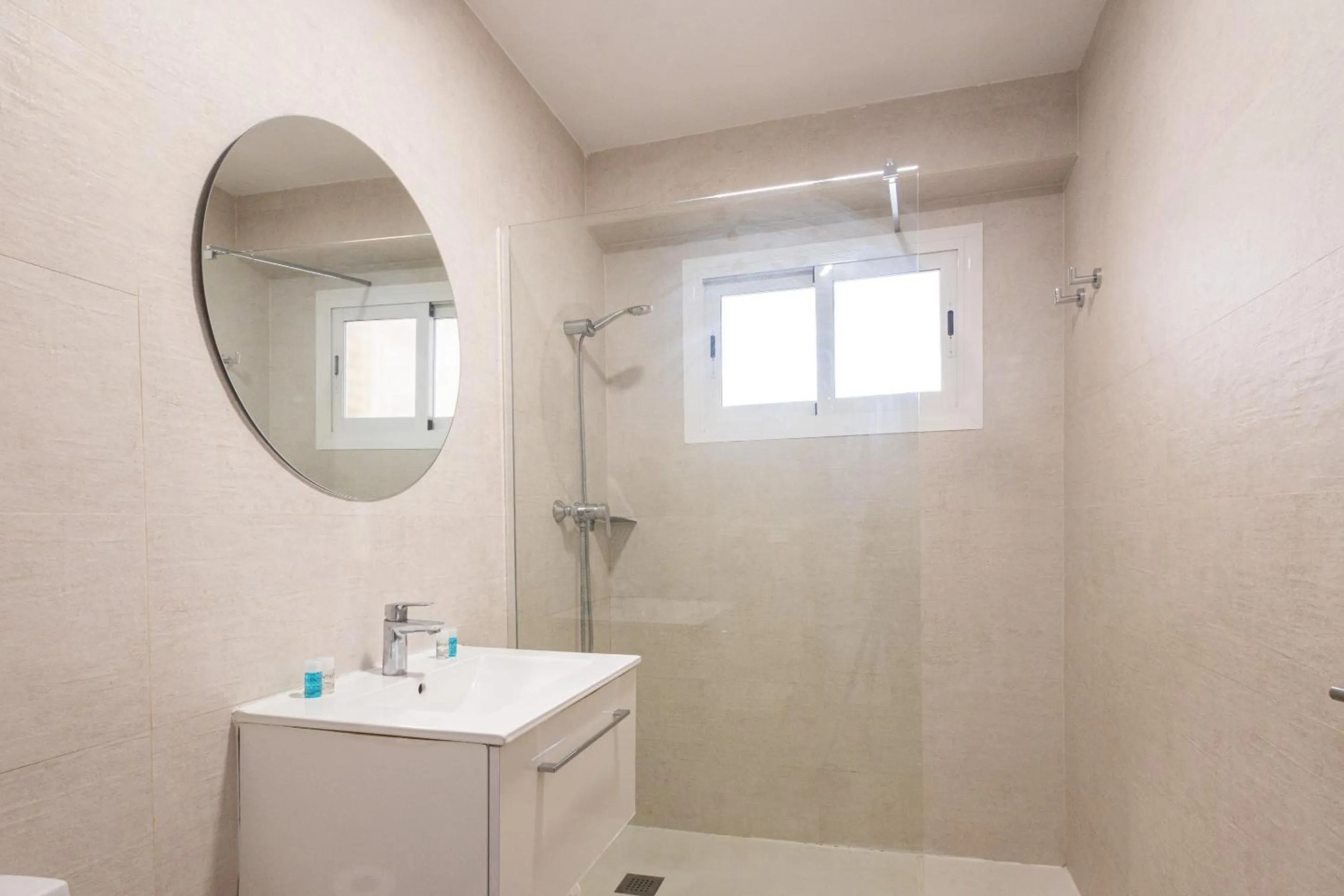 Shower in Apartamentos Odysea By Apartamentos Valentia