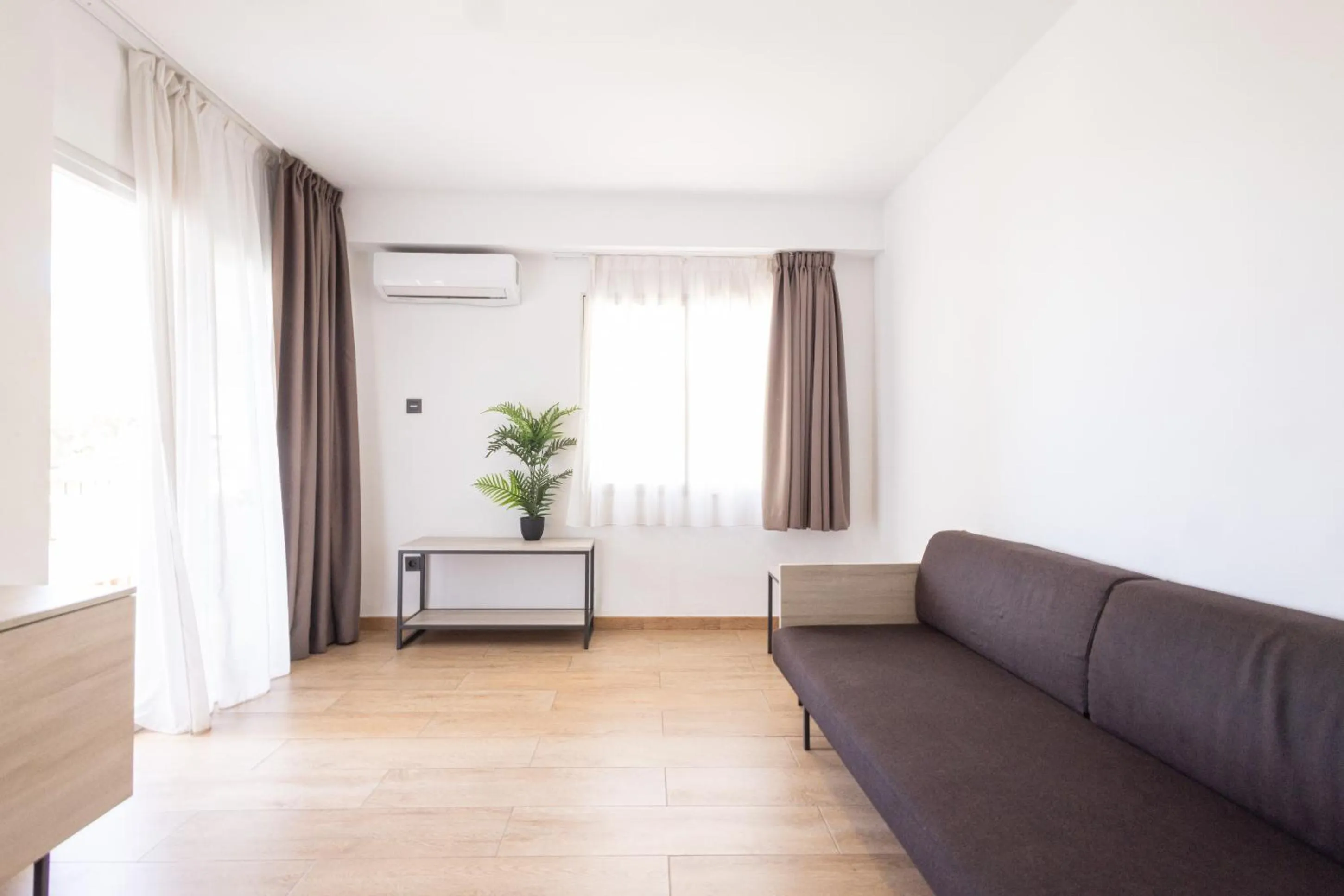 Living room in Apartamentos Odysea By Apartamentos Valentia