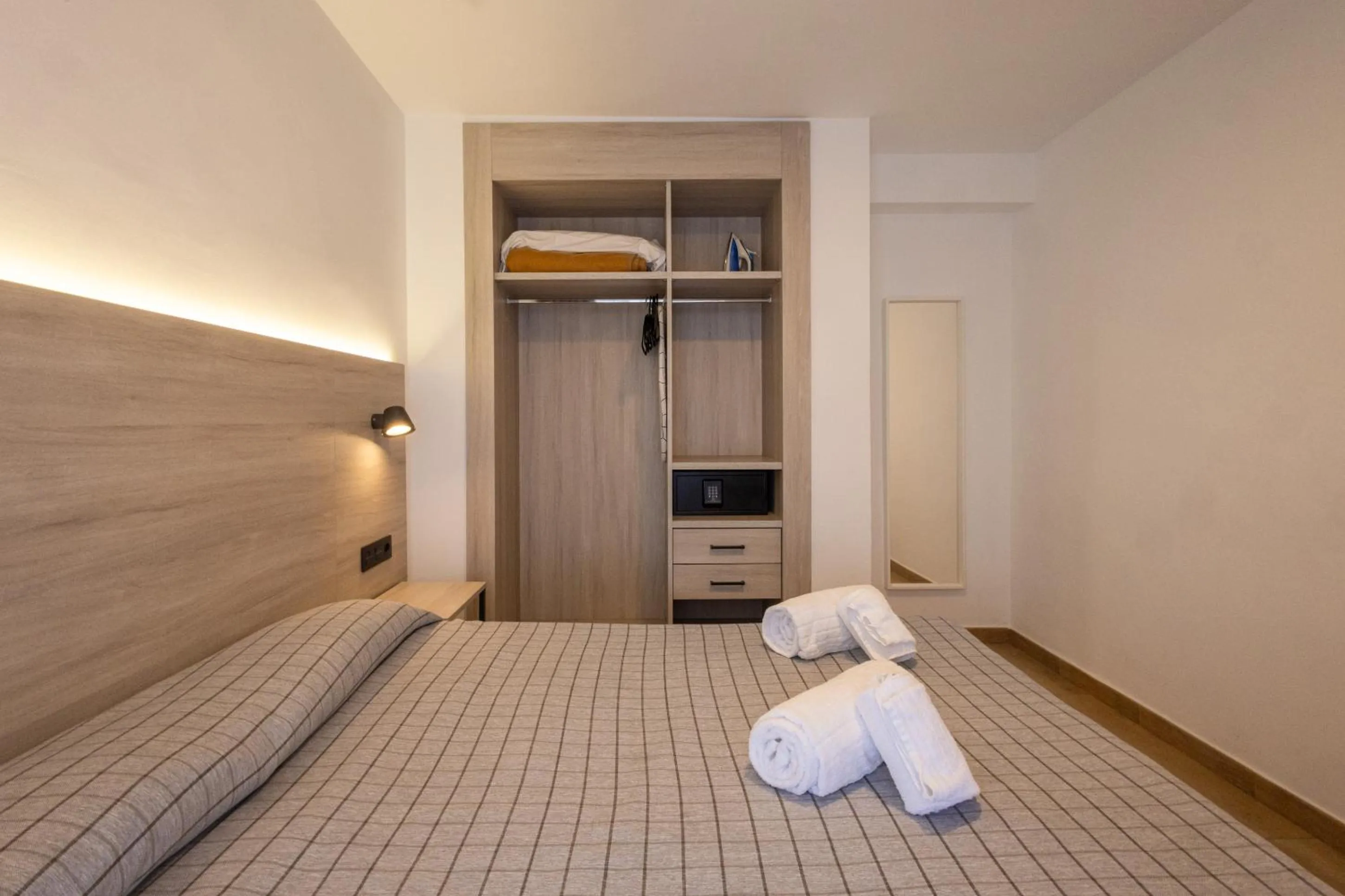 Bed in Apartamentos Odysea By Apartamentos Valentia