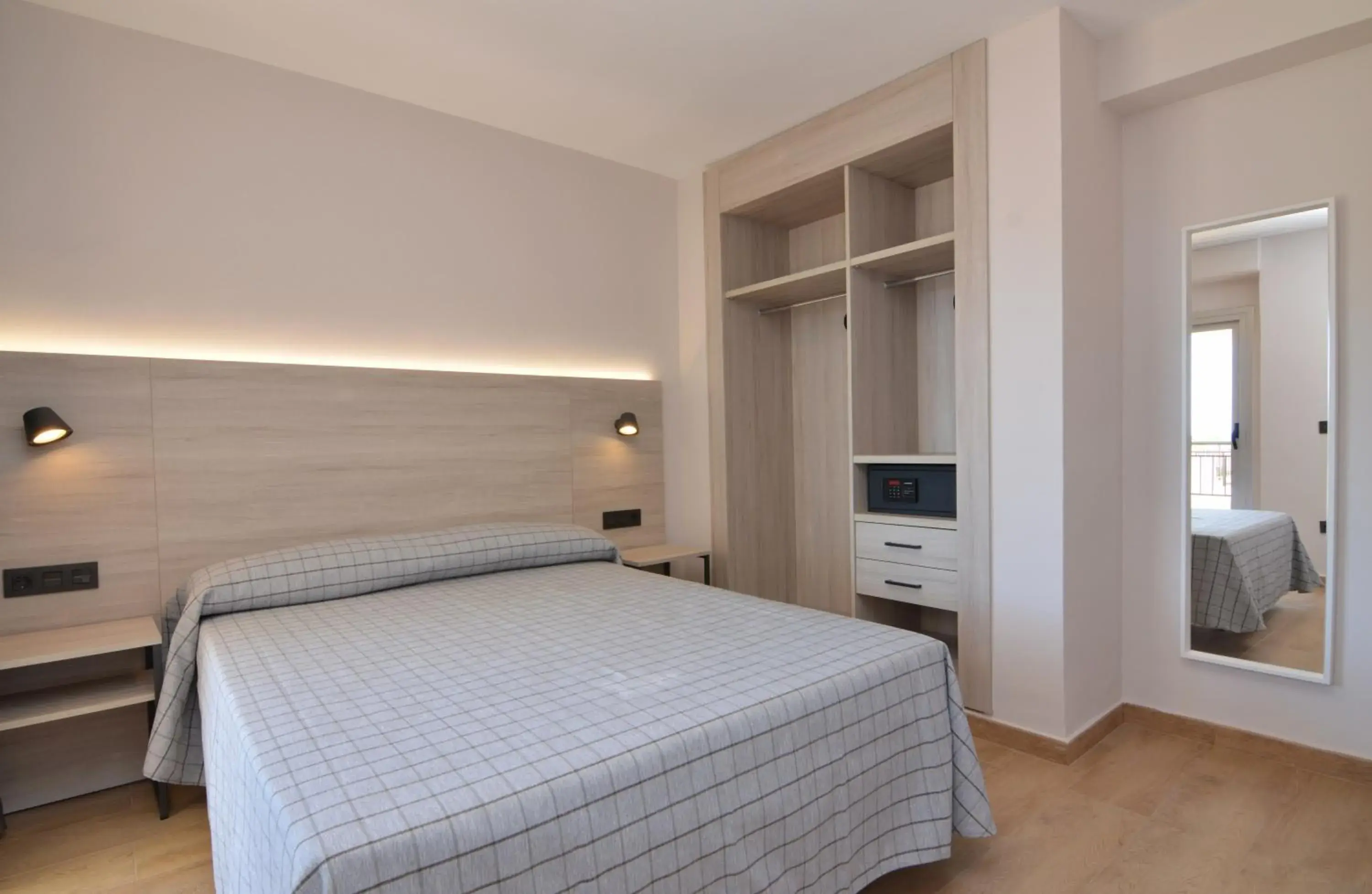 Bedroom, Bed in Apartamentos Odysea By Apartamentos Valentia Bedroom, Bed in Apartamentos Odysea By Apartamentos Valentia