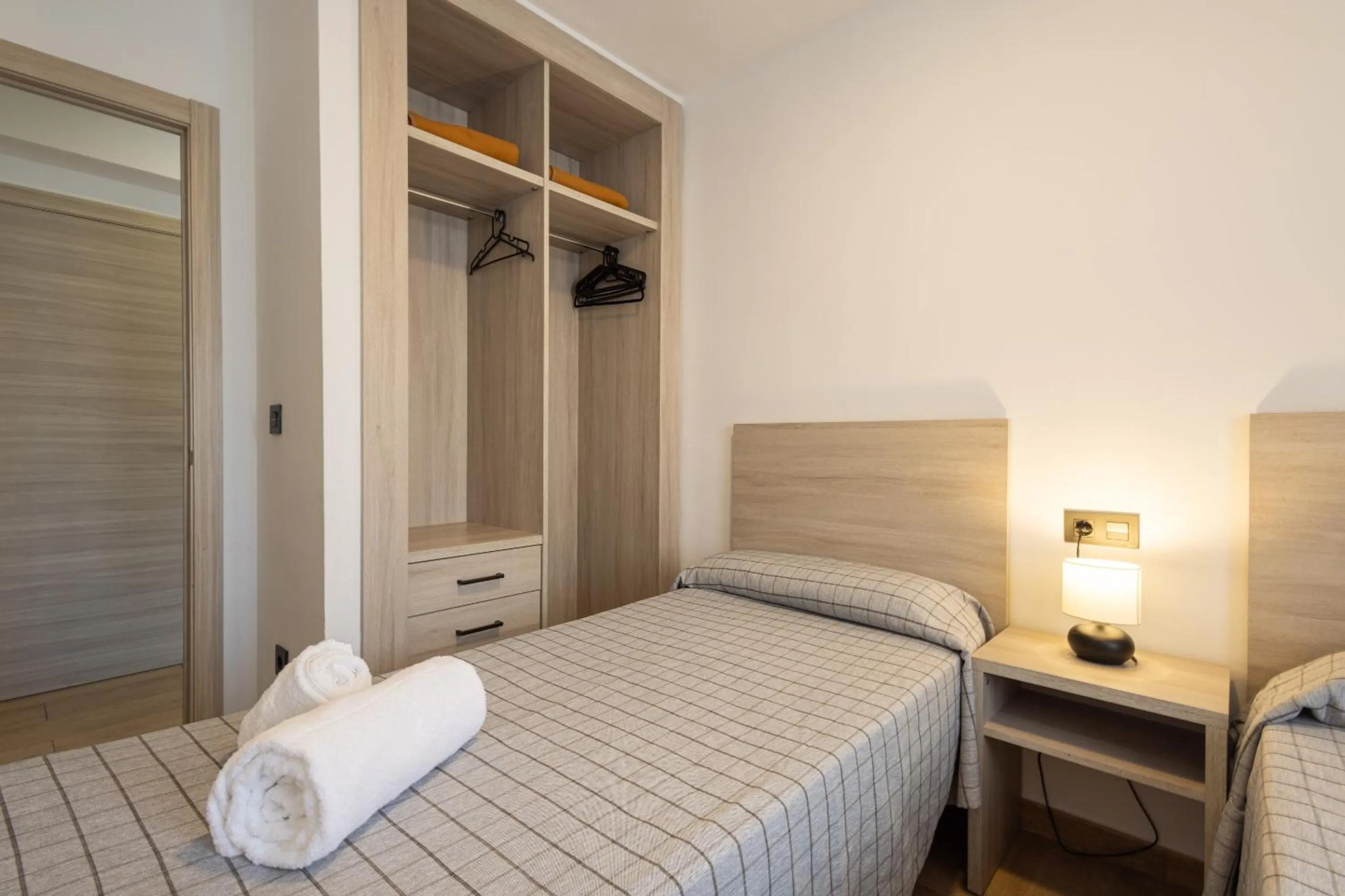 Bed in Apartamentos Odysea By Apartamentos Valentia