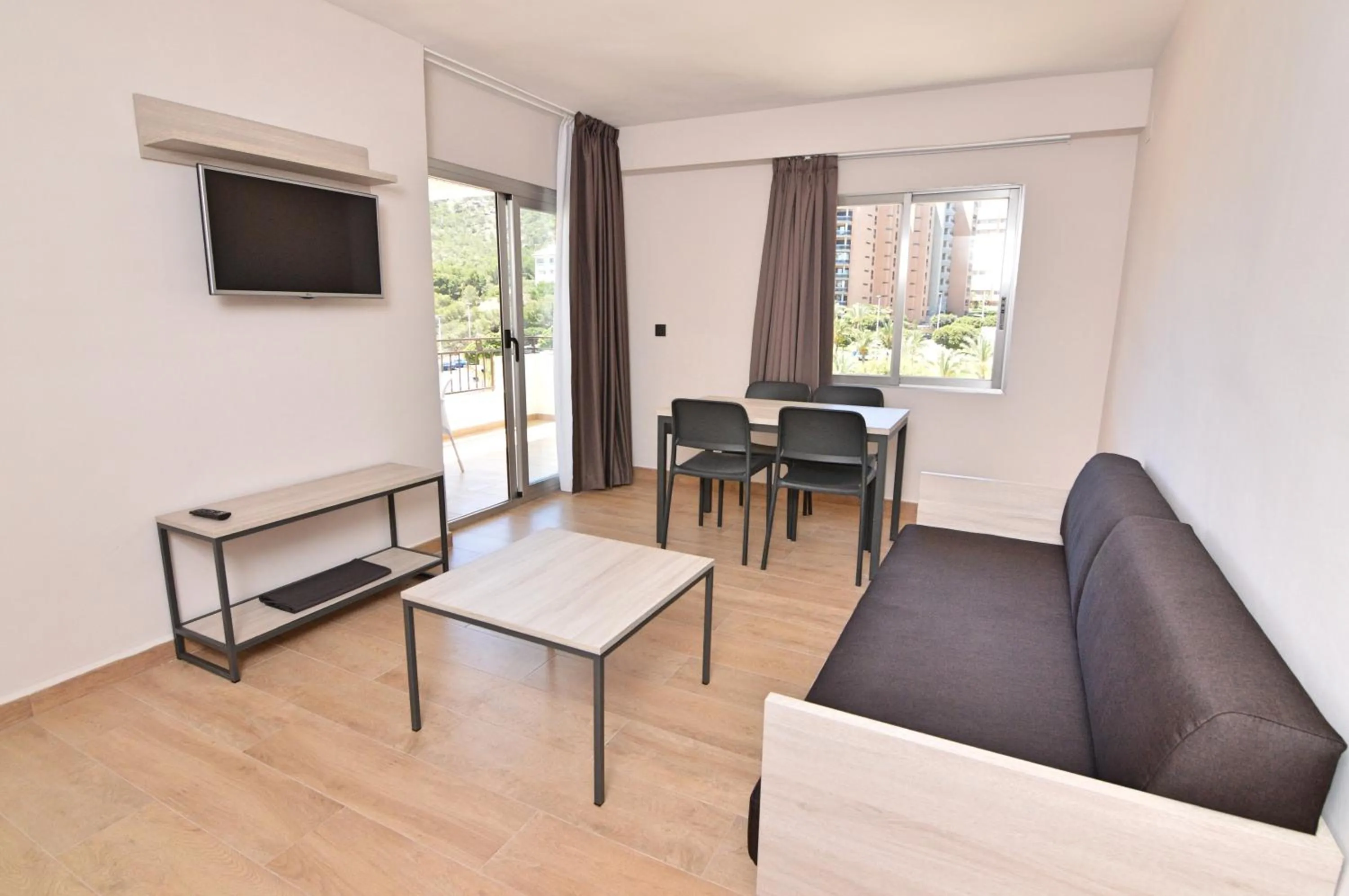 Living room in Apartamentos Odysea By Apartamentos Valentia