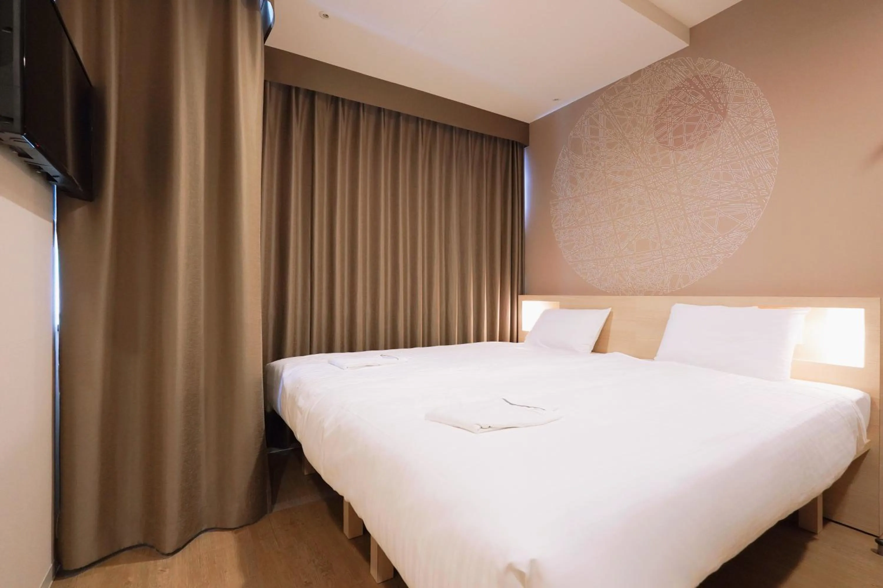 Bed in Park Central Sakura Hotel