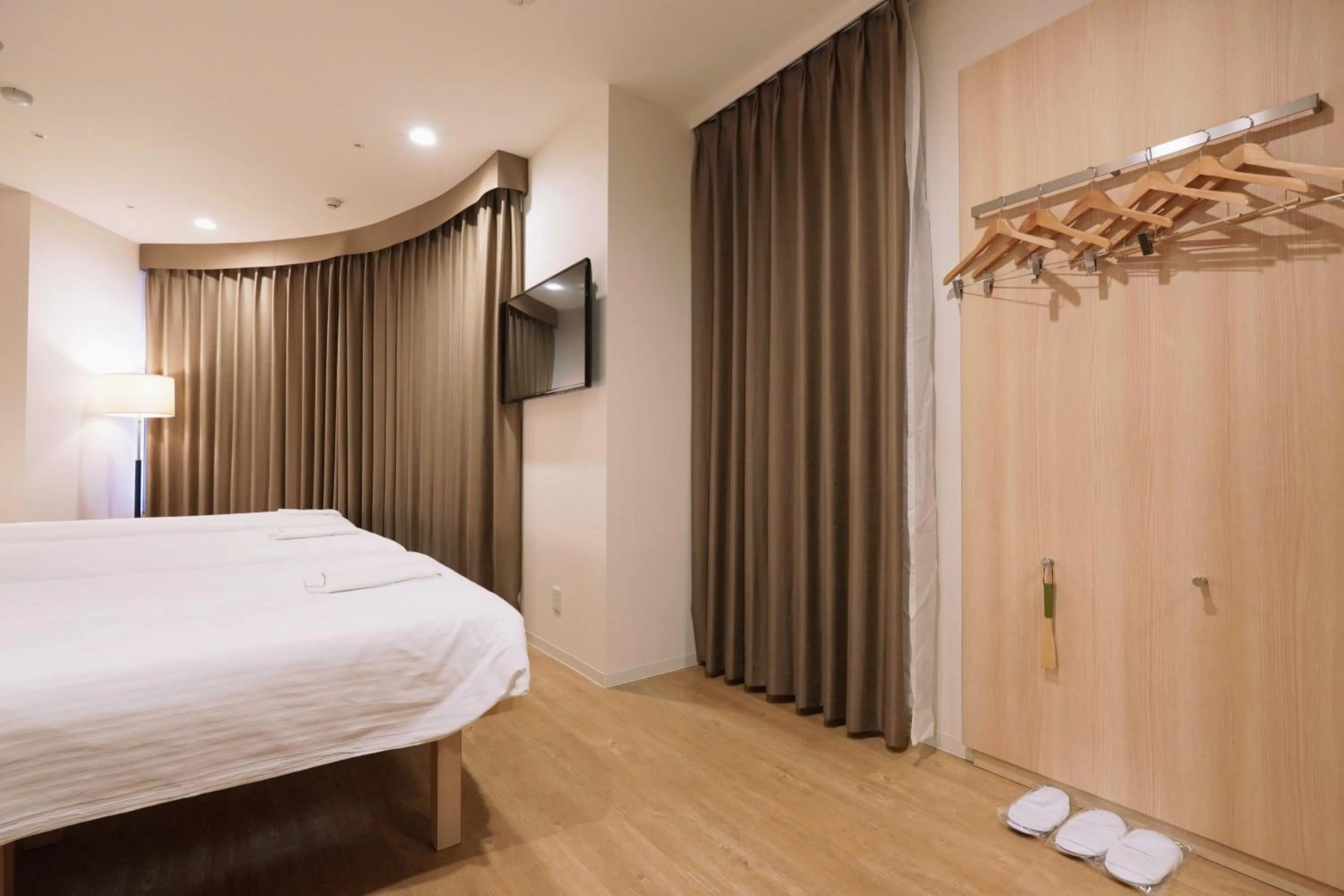 Bed in Park Central Sakura Hotel