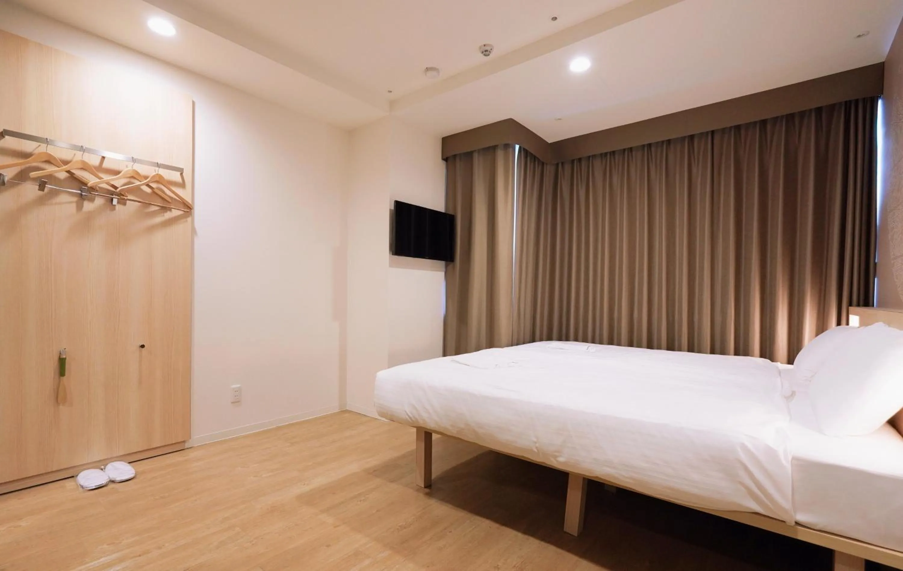 Bed in Park Central Sakura Hotel